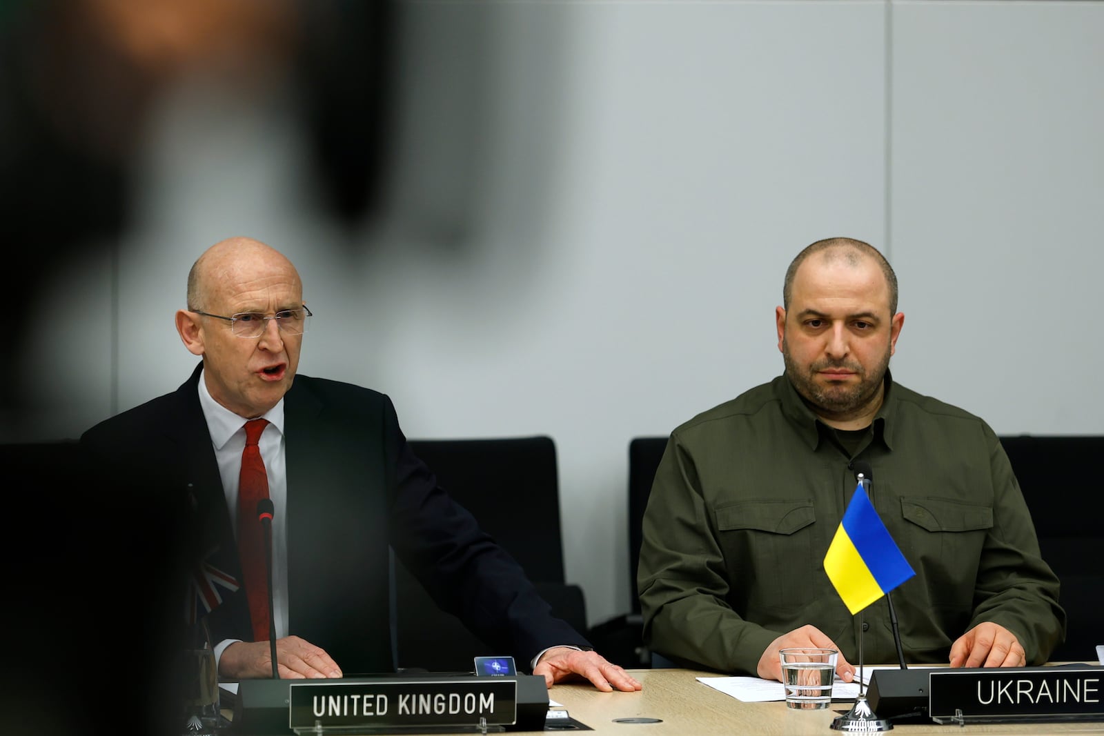 Britain's Defense Secretary John Healey, left, and Ukraine's Defense Minister Rustem Umerov attend a meeting of the Ukraine Defense Contact group at NATO headquarters in Brussels, Wednesday, Feb. 12, 2025. (AP Photo/Omar Havana)