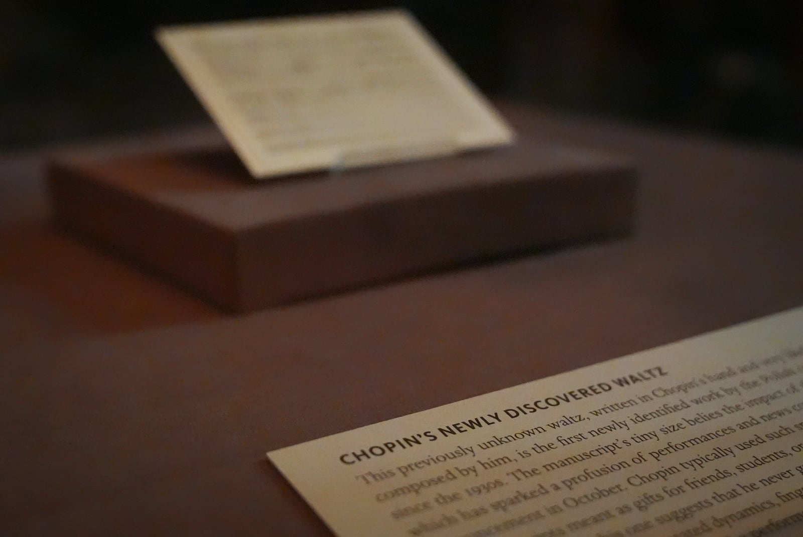 A previously unknown musical manuscript, possibly by Frederic Chopin, rests in a display case after it was discovered at The Morgan Library & Museum, Wednesday, Nov. 13, 2024, in New York. It's discovery marks the first such find since 1930, though its authenticity remains debated. (AP Photo/John Minchillo)