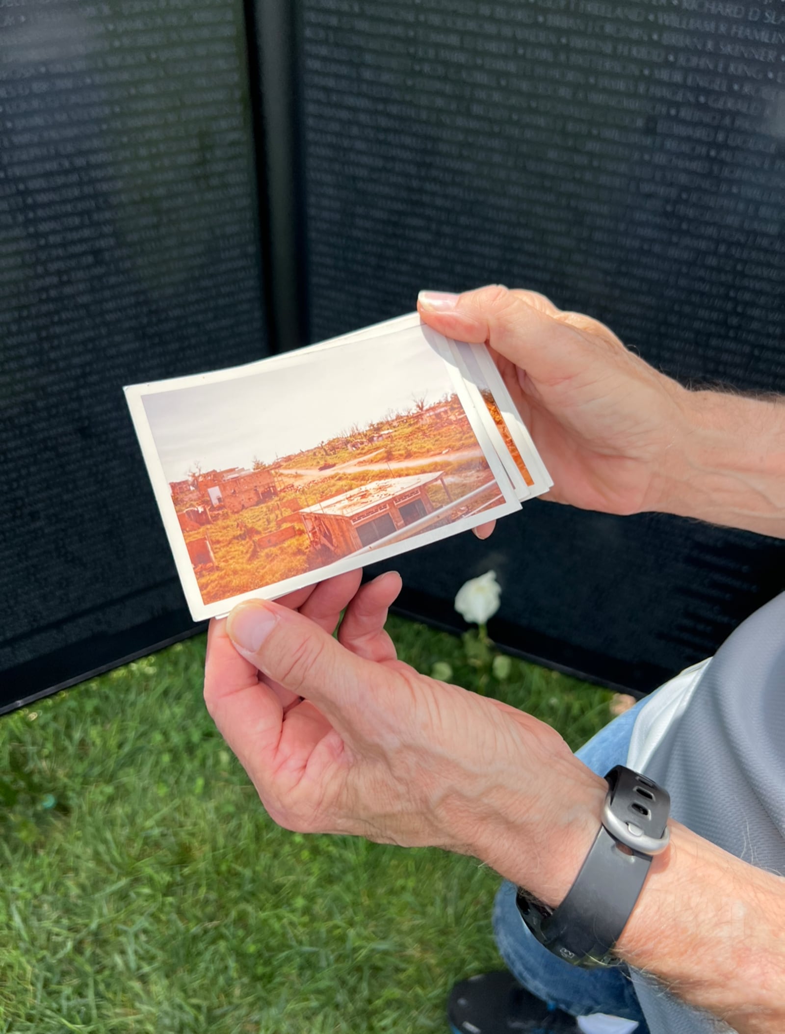 Vietnam veteran Jack Coulson visited the traveling Vietnam Wall Saturday, sharing photos from his time as a U.S. Army TOW missile system repairer in Vietnam. AIMEE HANCOCK/STAFF