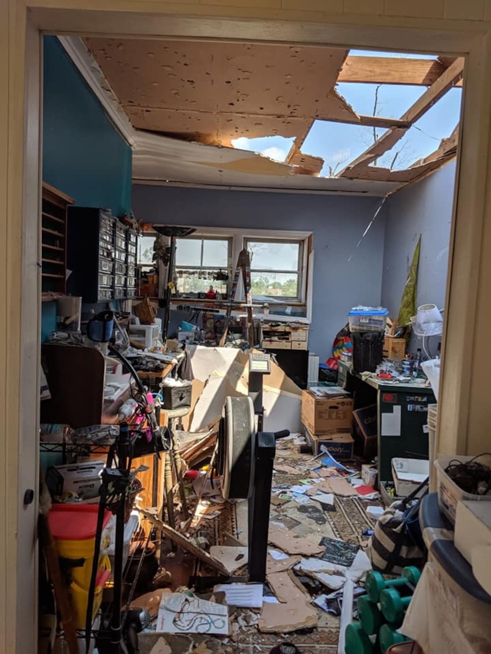 Robin Sassenberg’s  art room after the tornado struck. Friends and volunteers from Oregon District businesses helped remove debris in the wake of the Memorial Day tornadoes.