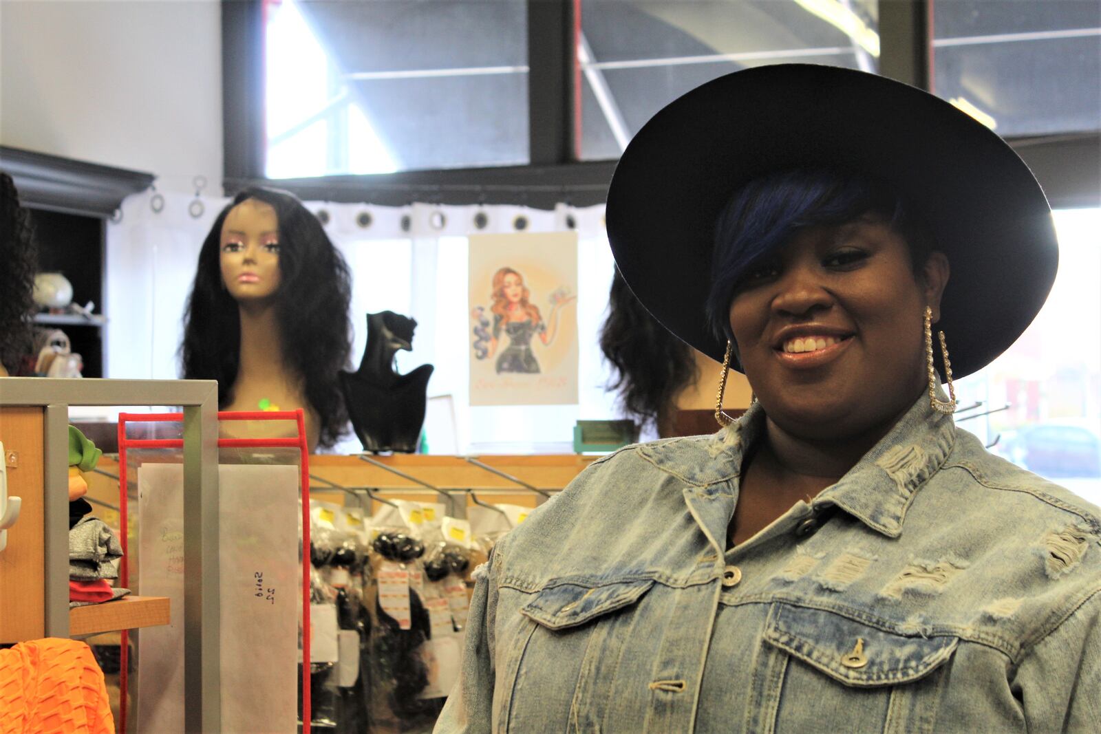 Tae Winston owns The Entrepreneurs Shoppe in the Historic Wright Dunbar Business District. CORNELIUS FROLIK / STAFF