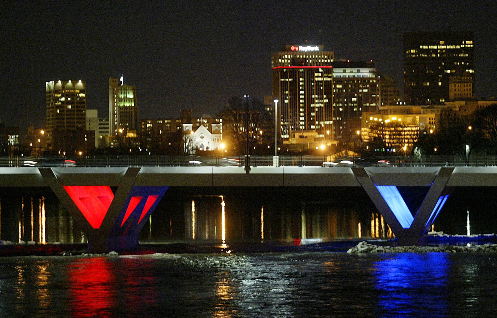 Stewart Street Bridge is decked out with blue and red lights to cheer on the University of Dayton men's basketball team's game against Boston University on Tuesday night, Dec. 29, 1010, about two months after it opened. The bridge had green and red light for the holiday season.