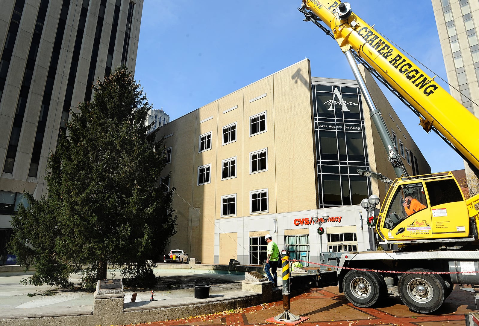 The tree for the 49th annual Dayton Holiday Festival arrived at Courthouse Square in downtown Dayton on Wednesday, Nov. 10, 2021. MARSHALL GORBY\STAFF