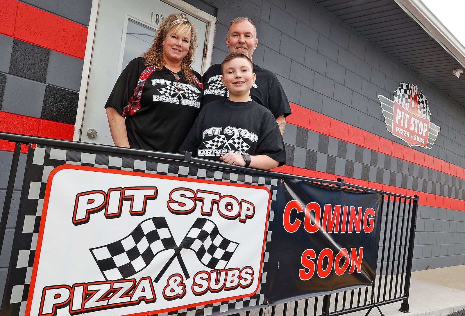 Shane and Tracy Shirk along with their son, Shane Jr., are excited to open Pit Stop Pizza & Subs on April 1, 2023. The restaurant, located on Columbus Avenue in Springfield, has featured a drive thru window since last summer where you can buy convenience store items along with coney dogs and sloppy joe sandwiches but soon will feature a dinning room and offer pizza and sub sandwiches. BILL LACKEY/STAFF