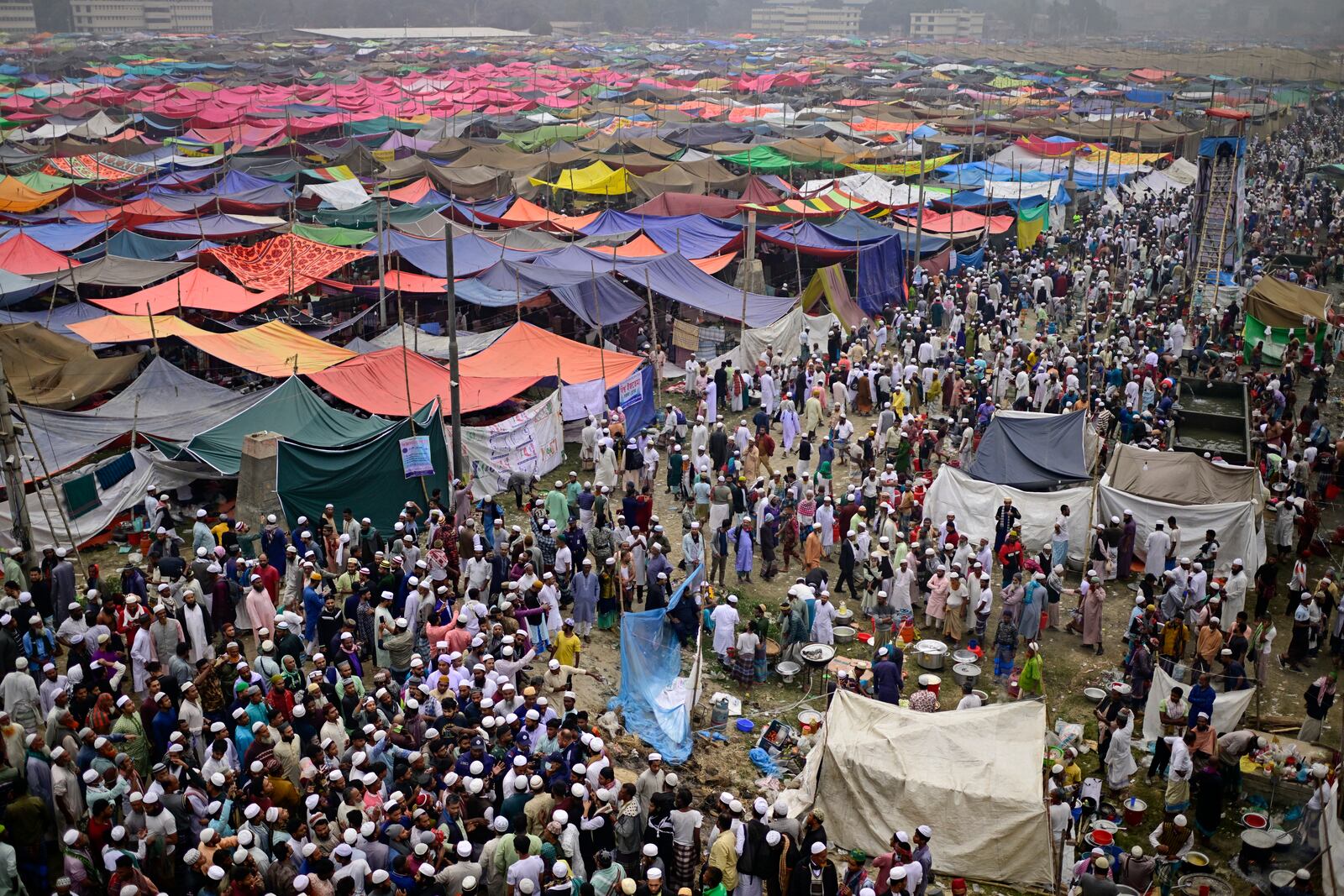 Muslim devotees gather during the first phase of the three-day Biswa Ijtema, or the World Congregation of Muslims, at the banks of the Turag river in Tongi, near Dhaka, Bangladesh, Friday, Jan. 31, 2025. (AP Photo/Mahmud Hossain Opu)