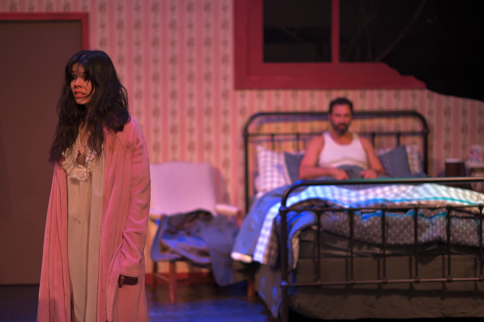 Adelyn Helms (Annie Wilkes) and Kaleb Smith (Paul Sheldon) in TheatreLab Dayton's production of "Misery." PHOTO BY MACKENSIE KING