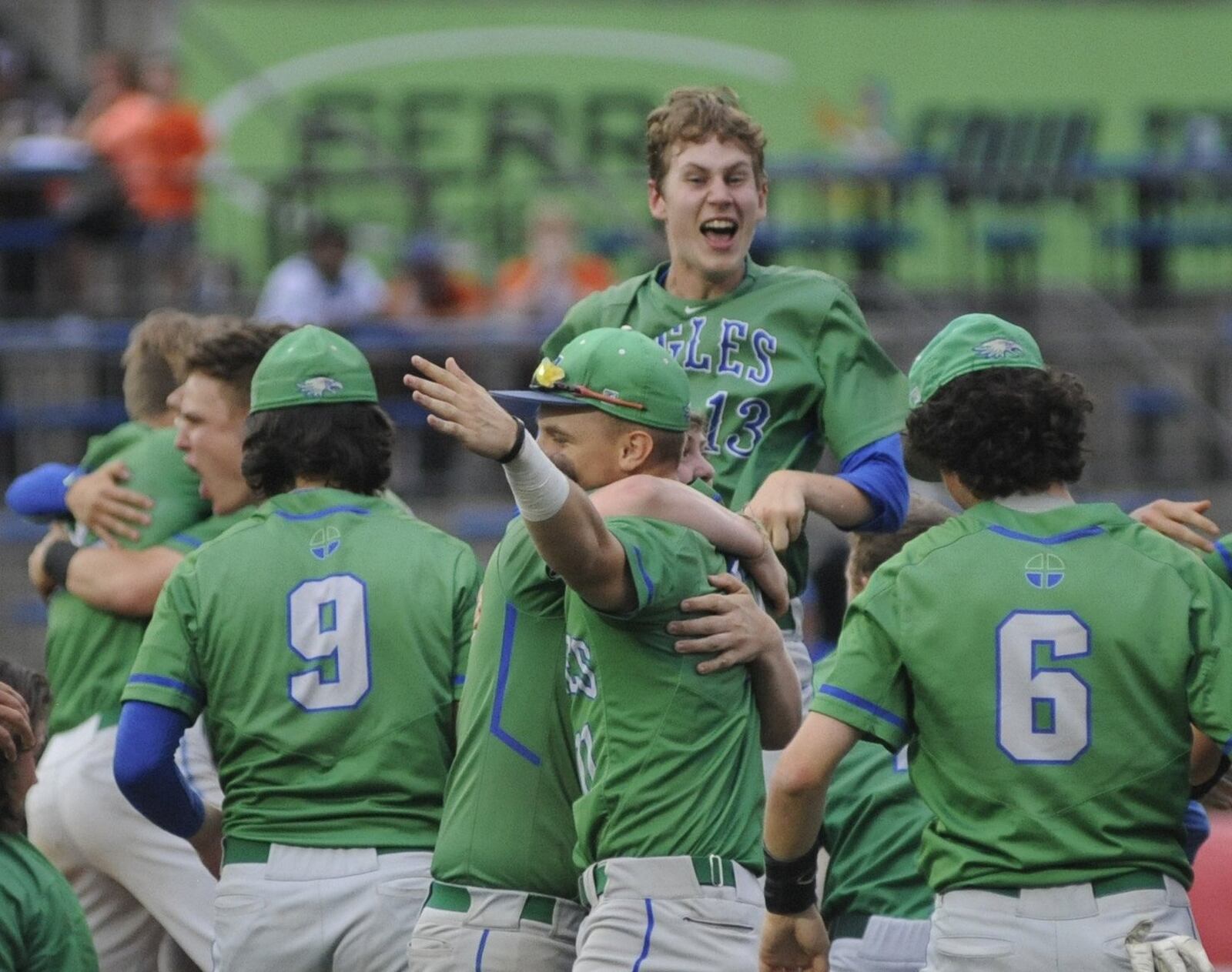 CJ celebrates a state title. MARC PENDLETON / STAFF