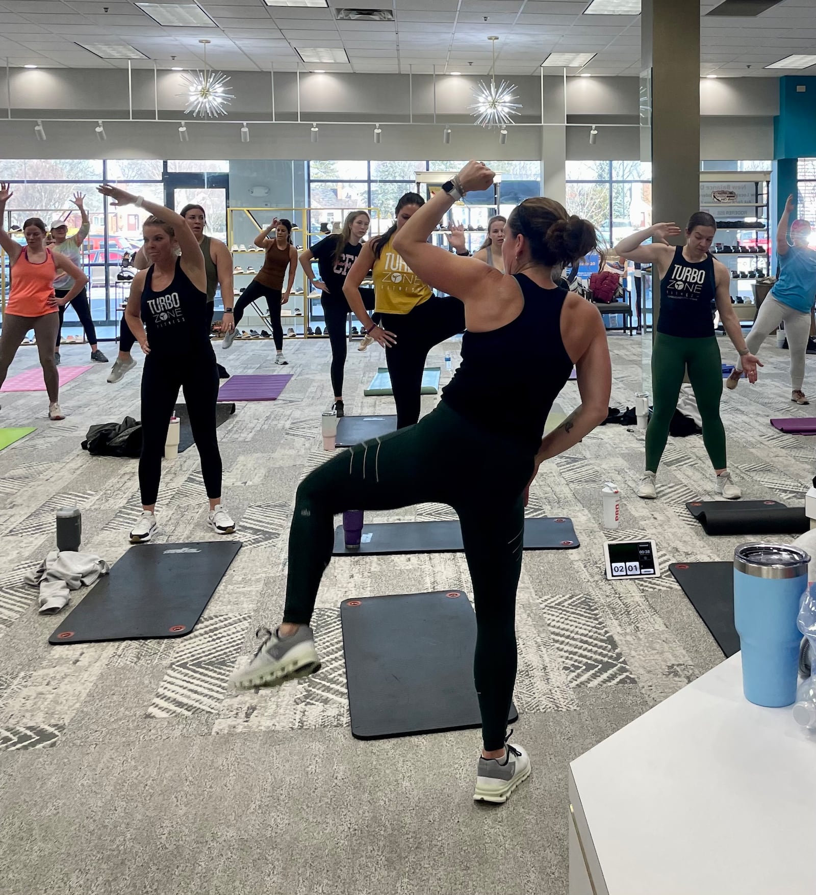 Turbo Zone Fitness recently brought its high-energy Tabata class to Roderer Shoe Center in Kettering. CONTRIBUTED