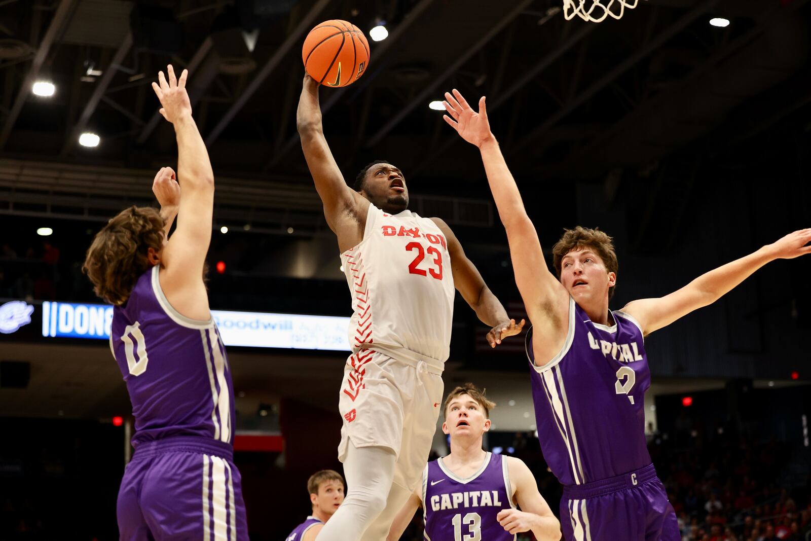 Dayton's R.J. Blakney dunks against Capital in the second half on Saturday, Oct. 29, 2022, at UD Arena. David Jablonski/Staff