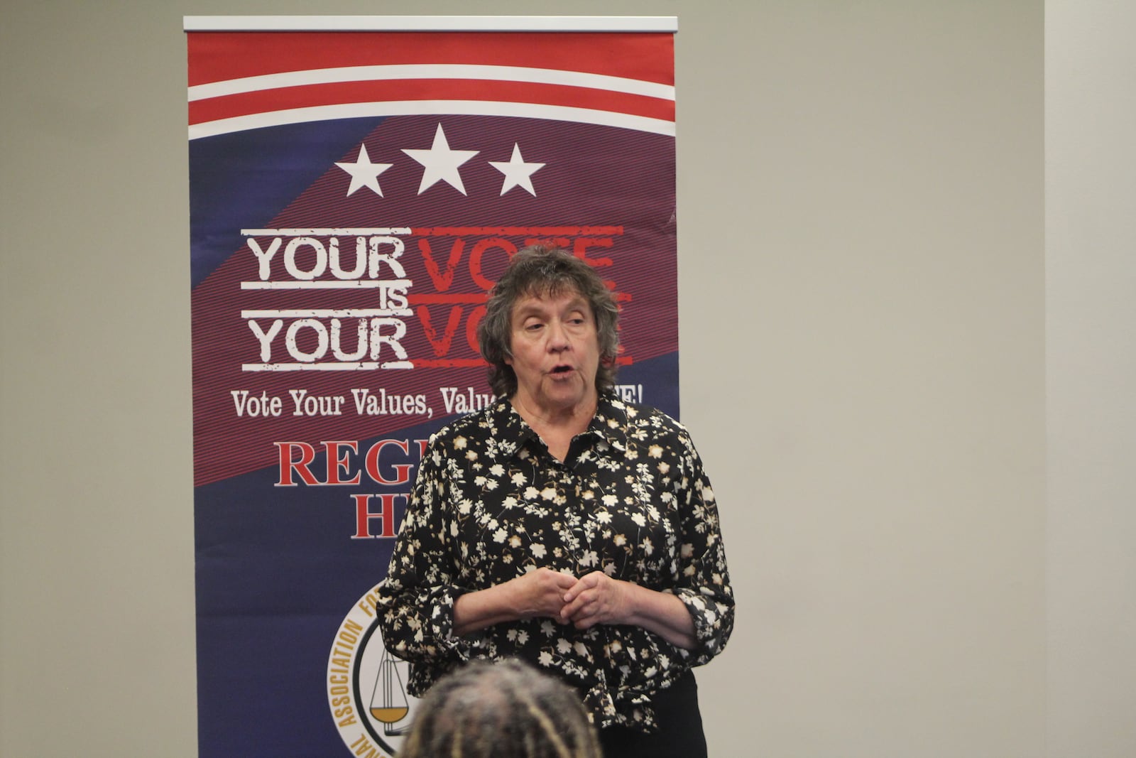 Valerie Duncan, a Dayton city commission candidate, speaks at a candidate forum hosted by the Dayton Unit NAACP. CORNELIUS FROLIK / STAFF