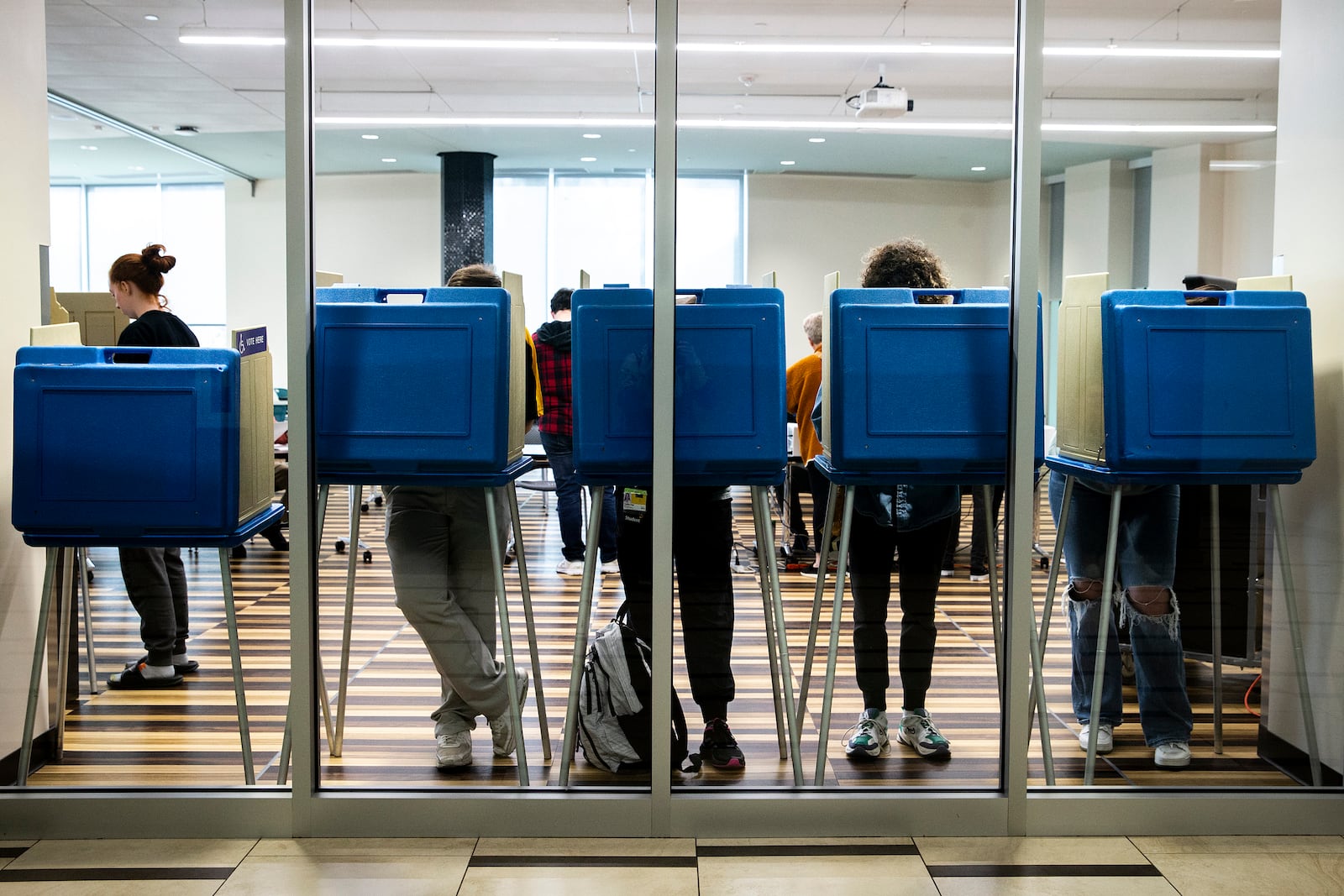 FILE - Voters fill out their ballots in booths on Election Day, Tuesday, Nov. 8, 2022, at Petersen Residence Hall on the University of Iowa campus in Iowa City, Iowa. (Joseph Cress/Iowa City Press-Citizen via AP, File)