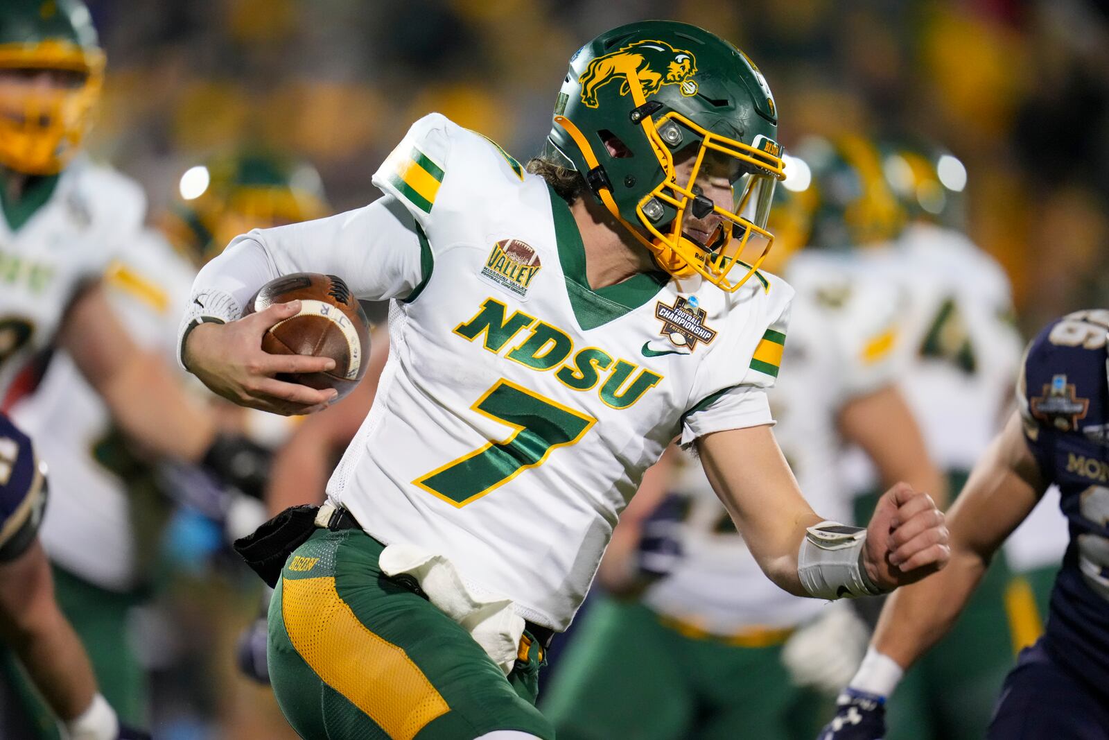 North Dakota State quarterback Cam Miller runs with the ball against Montana State during the first half of the FCS Championship NCAA college football game, Monday, Jan. 6, 2025, in Frisco, Texas. (AP Photo/Julio Cortez)