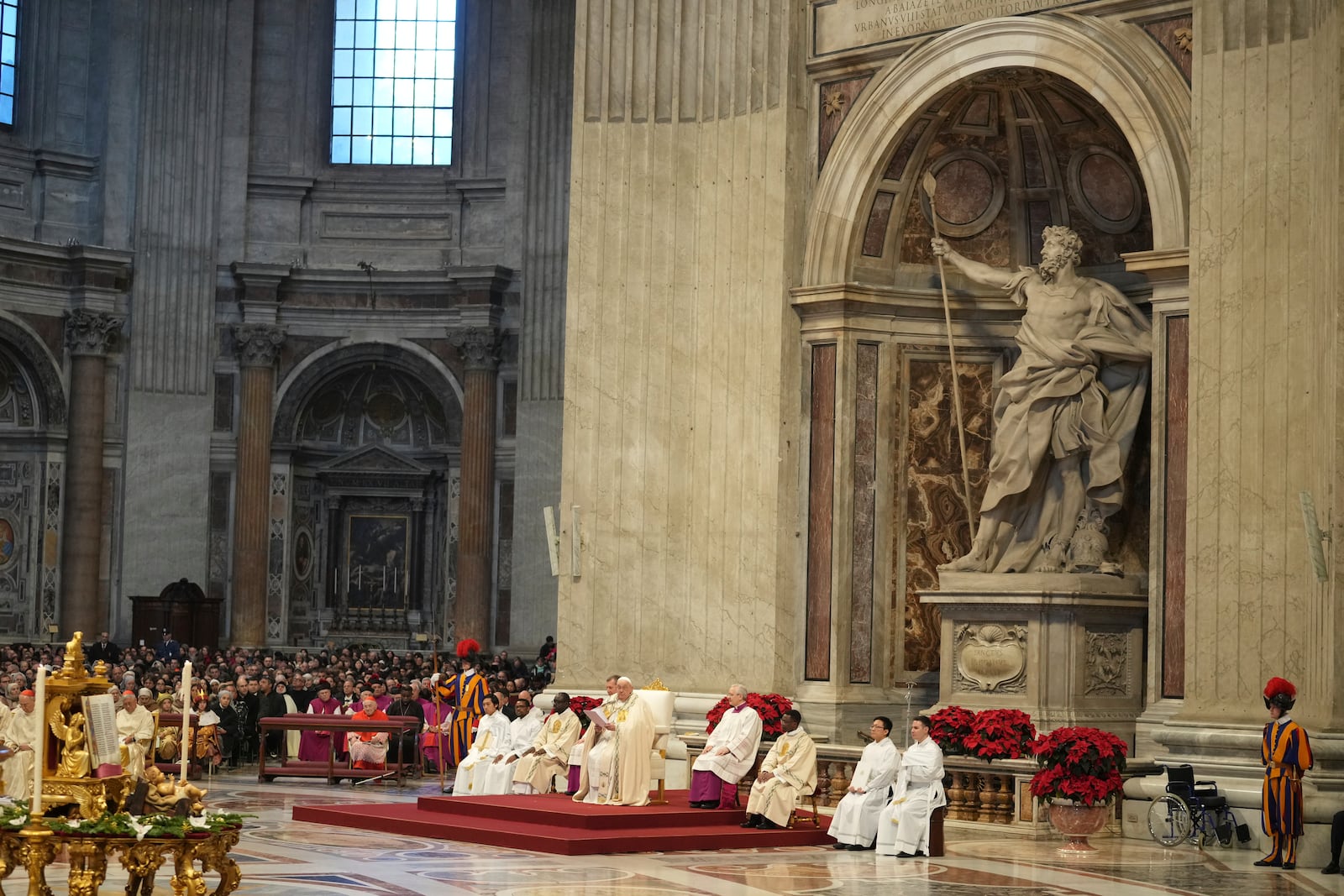 Pope Francis delivers his homily during a mass in St. Peter's Basilica at The Vatican on New Year's Day, Wednesday, Jan. 1, 2025. (AP Photo/Andrew Medichini)