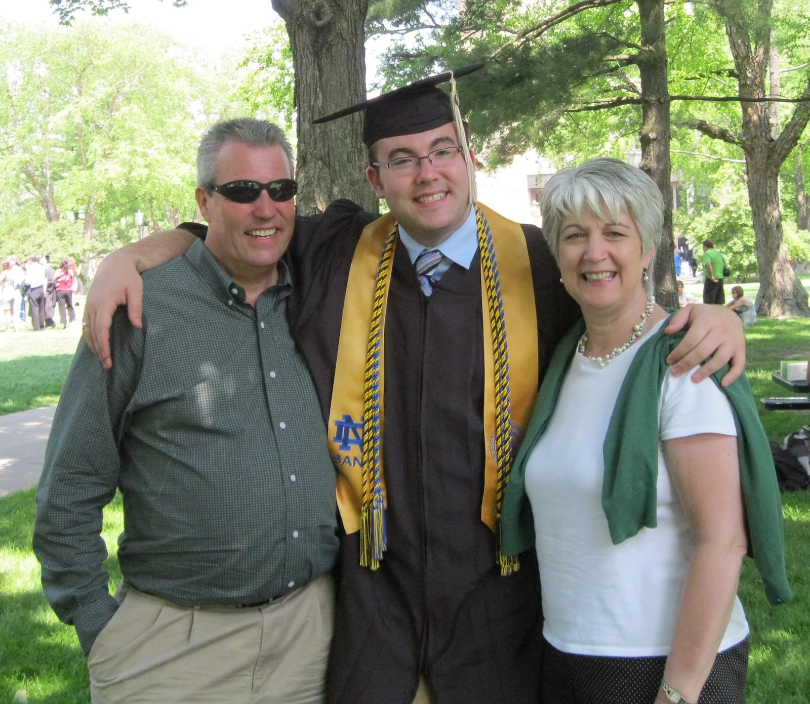 Melia (left) at his son, Hal's graduation from the University of Notre Dame in 2012. L-R Melia, son Hal and wife Rosie.