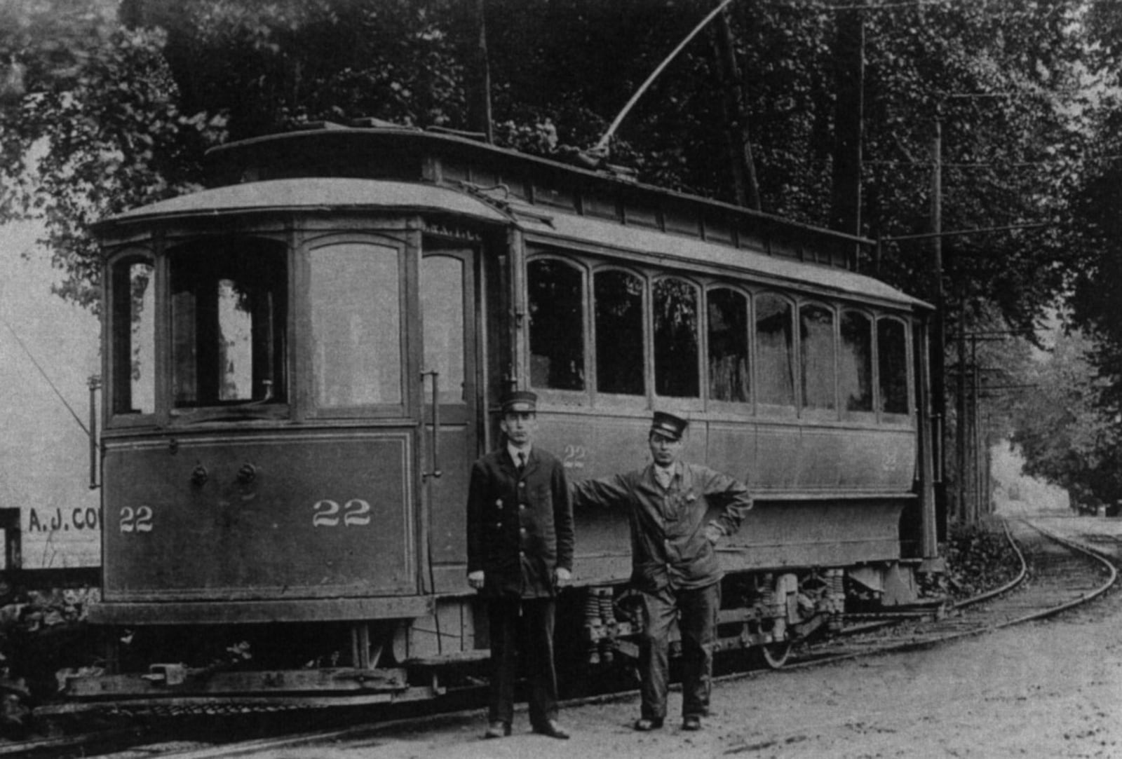 An early photograph of a traction car on the rails in Bellbrook.