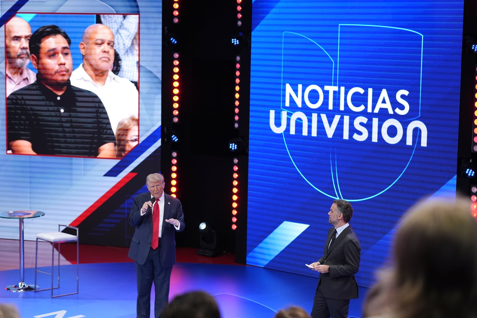 Republican presidential nominee former President Donald Trump speaks during a Univision town hall, Wednesday, Oct. 16, 2024, in Doral, Fla., with Televisa's Enrique Acevedo. (AP Photo/Alex Brandon)