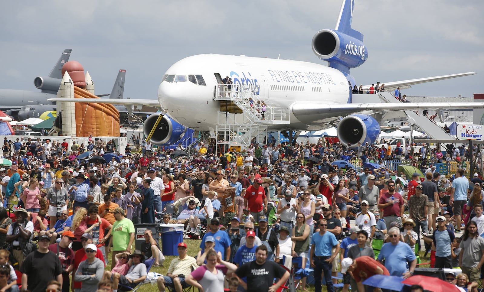 A thick crowd watches the performers during the 2018 Vectren Dayton Air Show. TY GREENLEES / STAFF