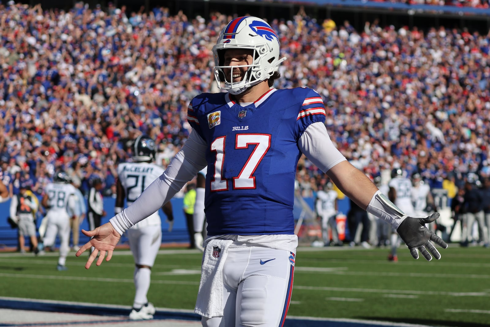 Buffalo Bills quarterback Josh Allen (17) celebrates a touchdown during the second half of an NFL football game against the Tennessee Titans, Sunday, Oct. 20, 2024, in Orchard Park, N.Y. (AP Photo/Jeffrey T. Barnes)