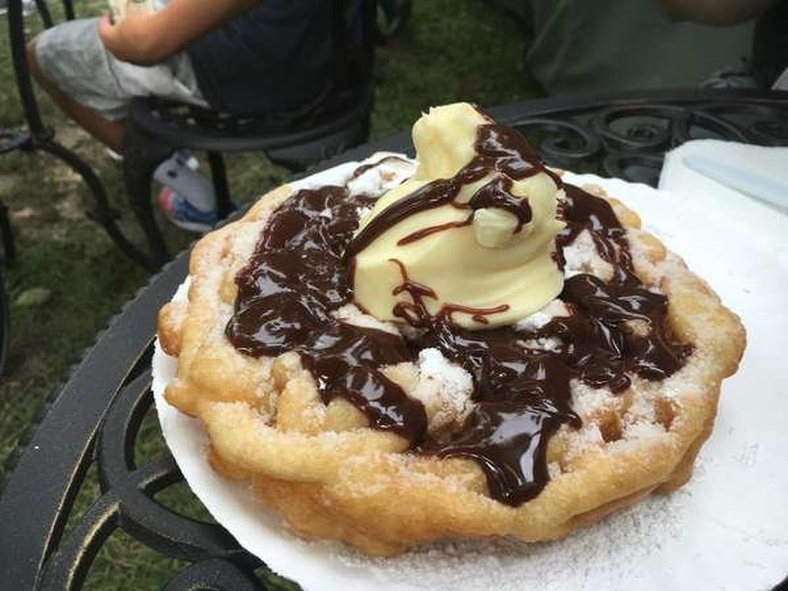 There are several varieties of funnel cakes at the Great Darke County Fair, including this Boston Cream version. JIM INGRAM/STAFF