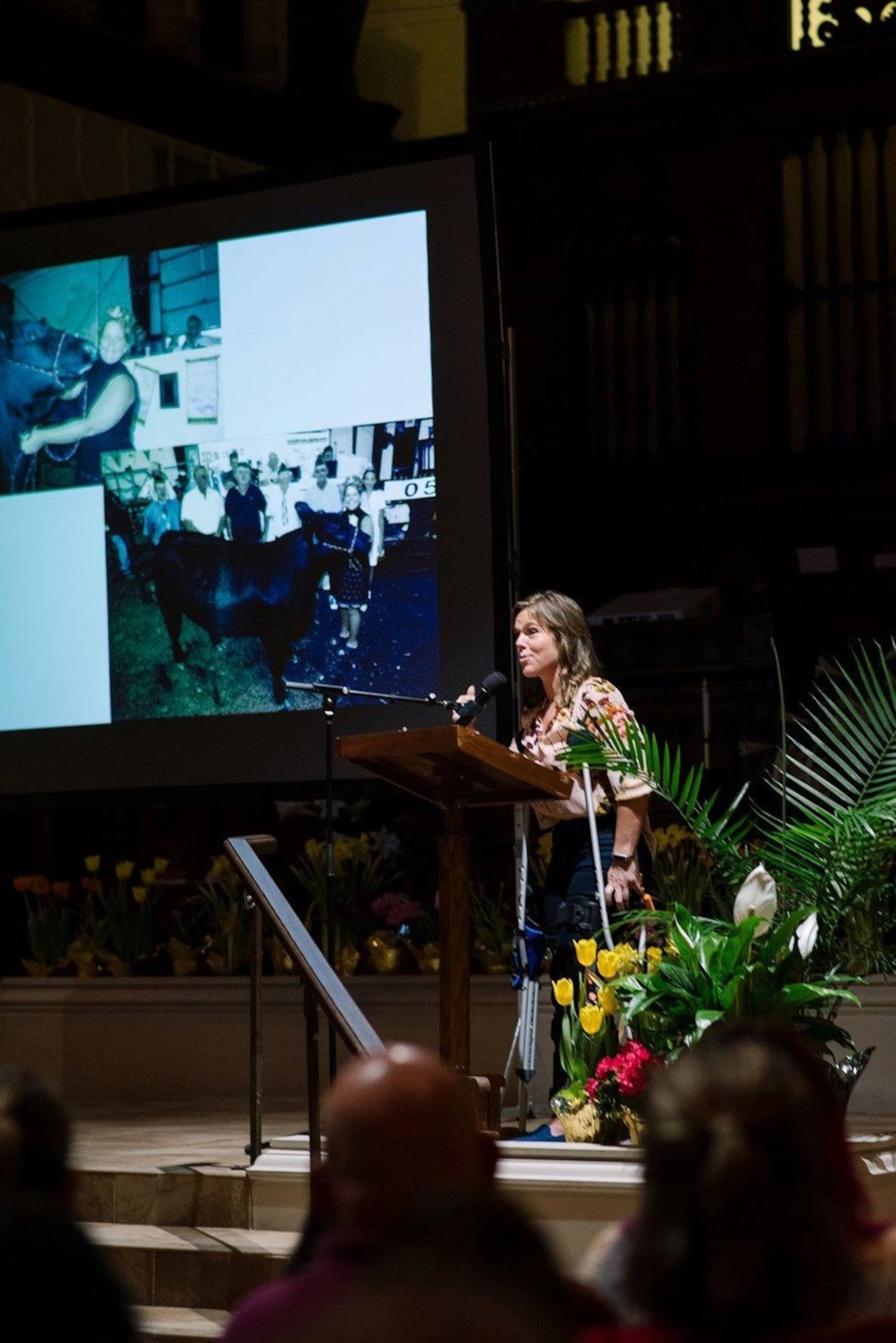 Twenty slides are shown for 20 seconds each while each speaker provides narration during PechaKucha. Corin Brewer gives her talk, “Dominating My Discomfort." CONTRIBUTING