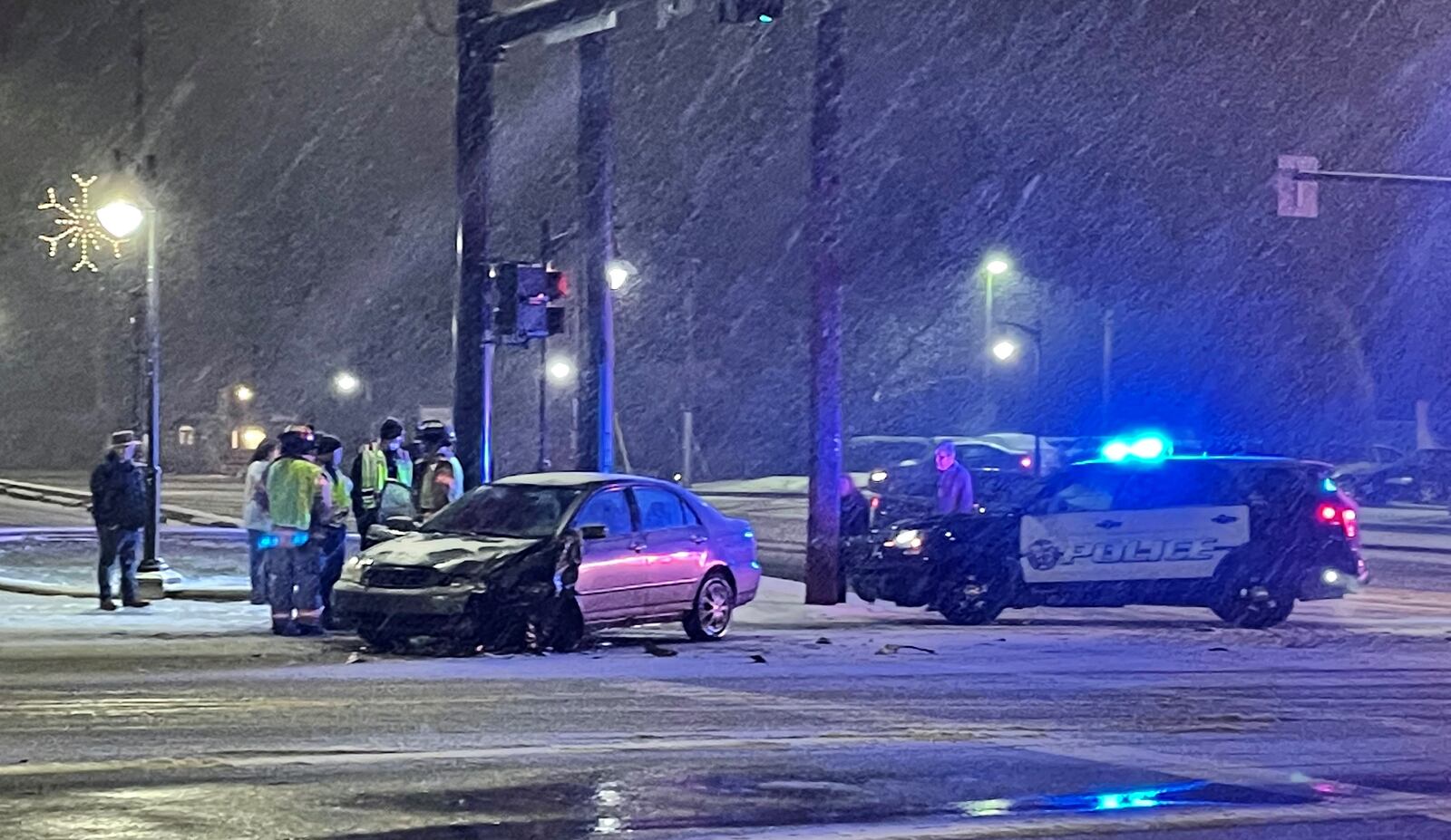 The driver of a red car walked away, headed east down Stroop Road Sunday night, Jan. 16, 2022, after a two-car injury crash at the intersection of Stroop Road and Far Hills Avenue in Kettering. JEN BALDUF / STAFF