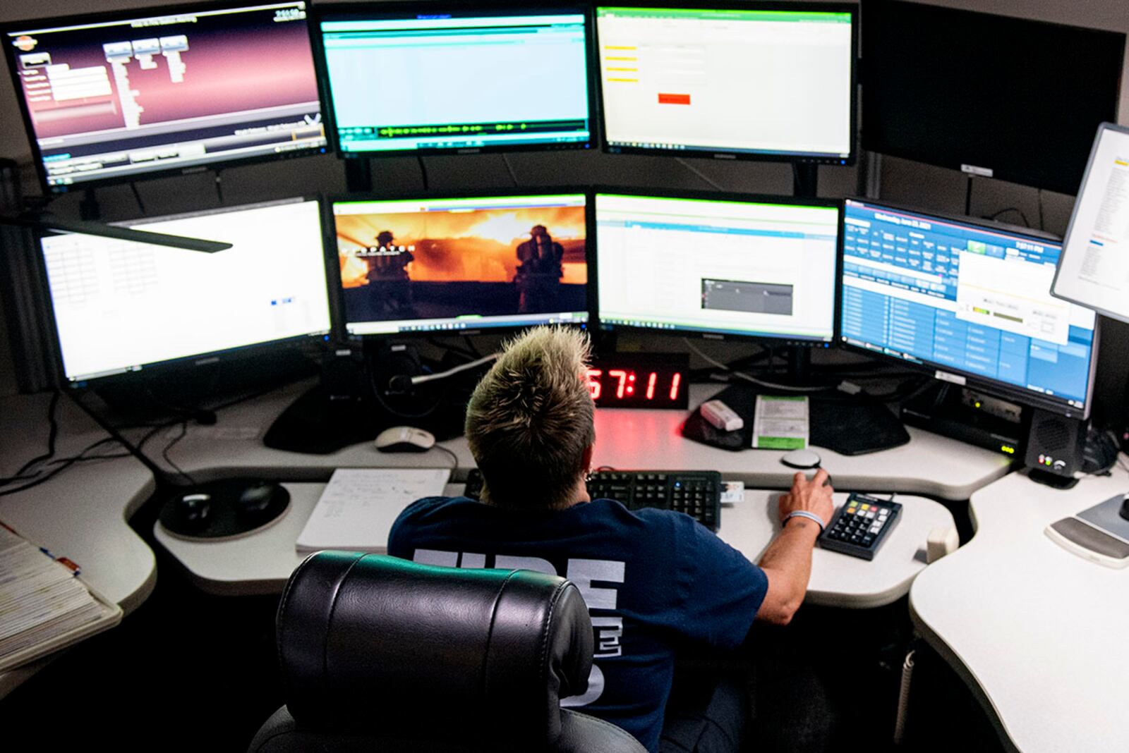 Marian Nevin, 788th Civil Engineer Squadron Fire Department dispatcher, works inside Station 1’s control and dispatch room June 23 at Wright-Patterson Air Force Base. U.S. AIR FORCE PHOTO/WESLEY FARNSWORTH