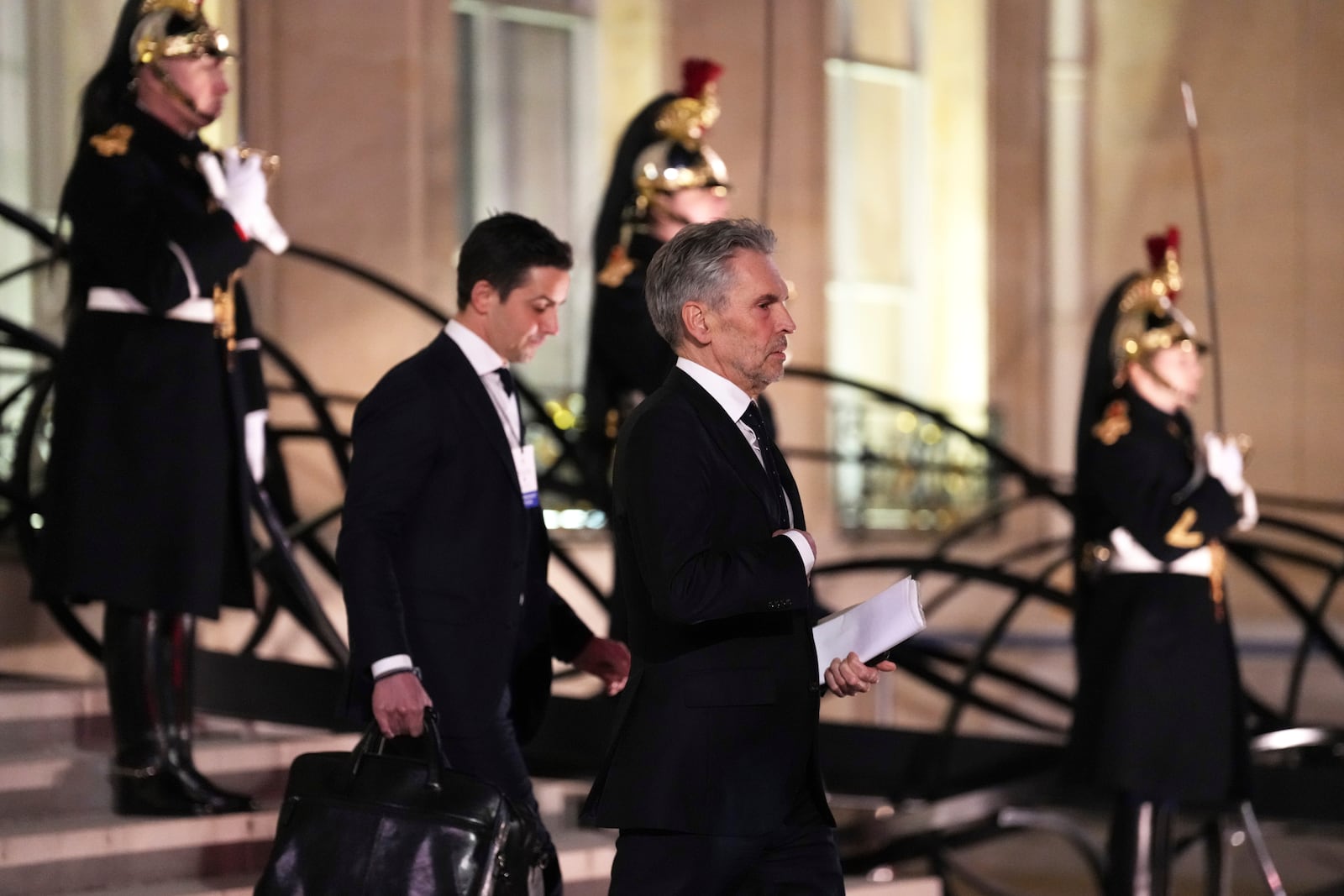 Netherland's Prime Minister Dick Schoof, center, leaves the Elysee Palace, after an informal meeting of leaders from key European Union nations and the United Kingdom, in Paris, Monday, Feb. 17, 2025. (AP Photo/Aurelien Morissard)