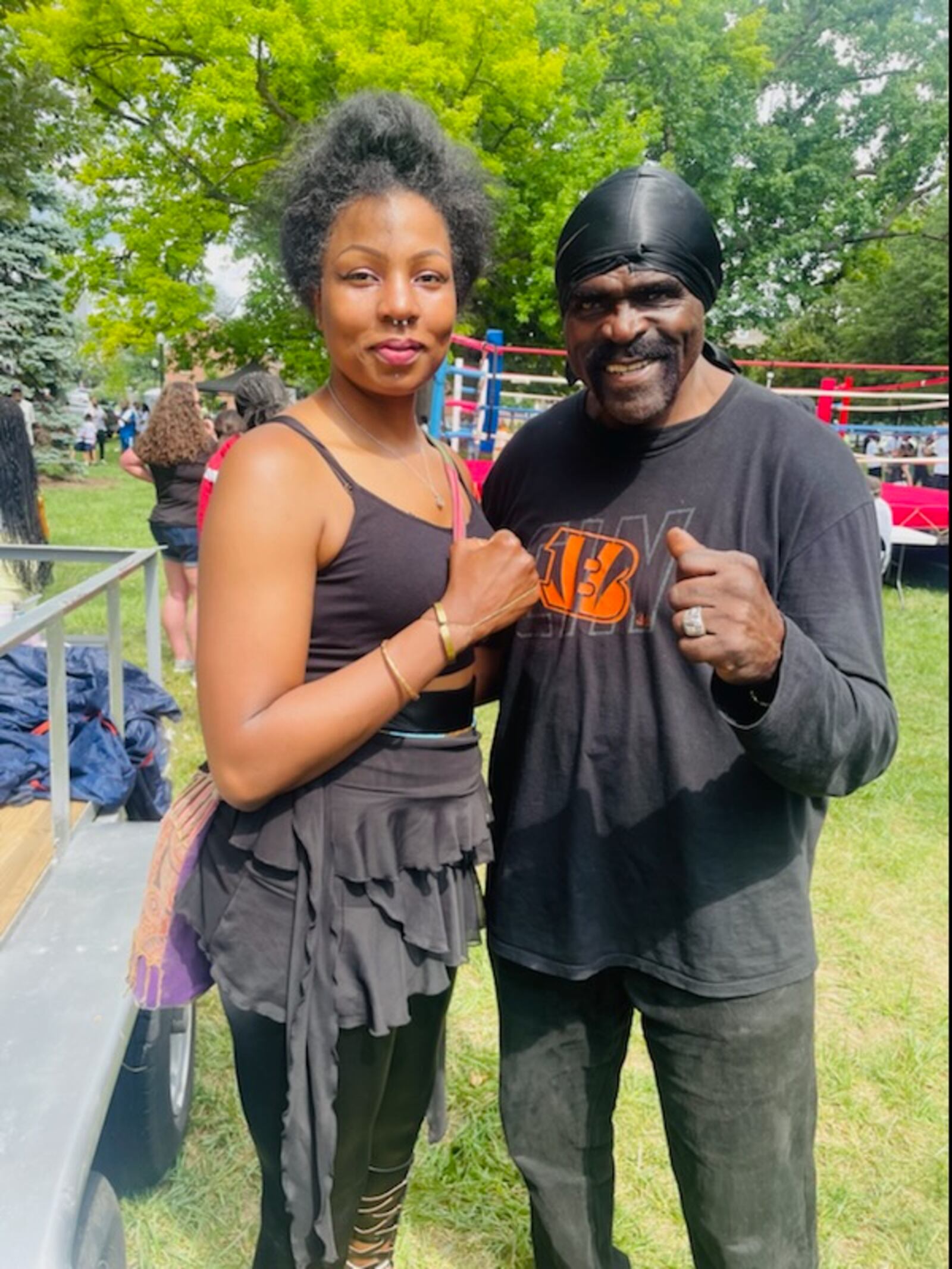 Chia Fei Asbury and former heavyweight champ Tony “TNT” Tubbs, who helps train her. CONTRIBUTED