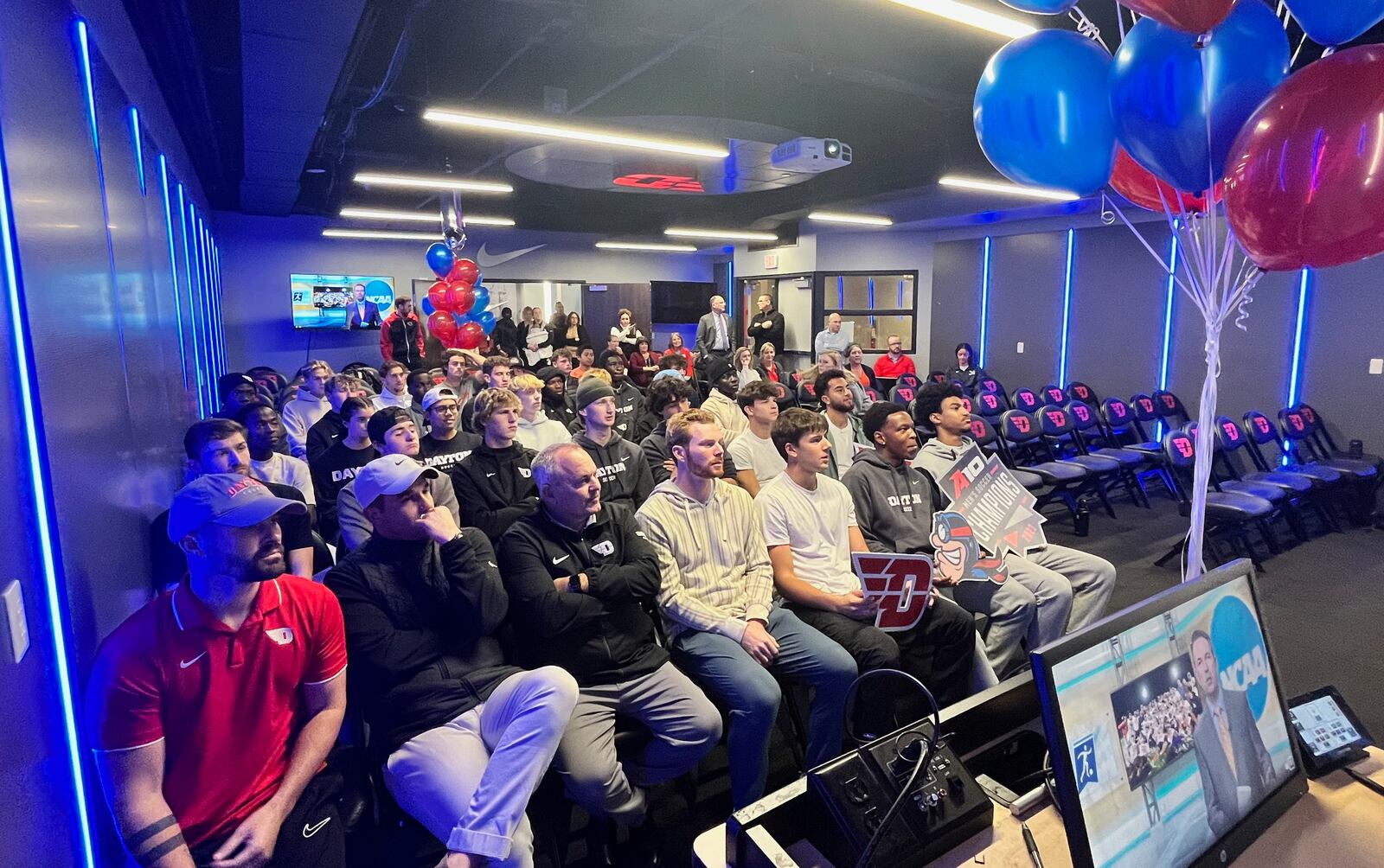 Dayton men's soccer players watch the NCAA tournament selection show on Monday, Nov. 13, 2023, at the Frericks Center. David Jablonski/Staff