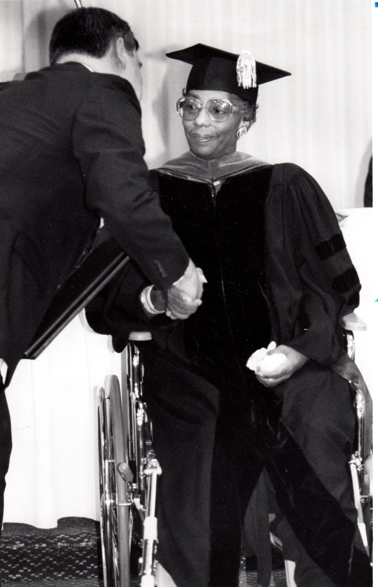 Jeraldyne Blunden was awarded an honorary doctrate from the University of Dayton in 1990. Then UD President Brother Raymond Fitz congratulates her. DAYTON DAILY NEWS ARCHIVE