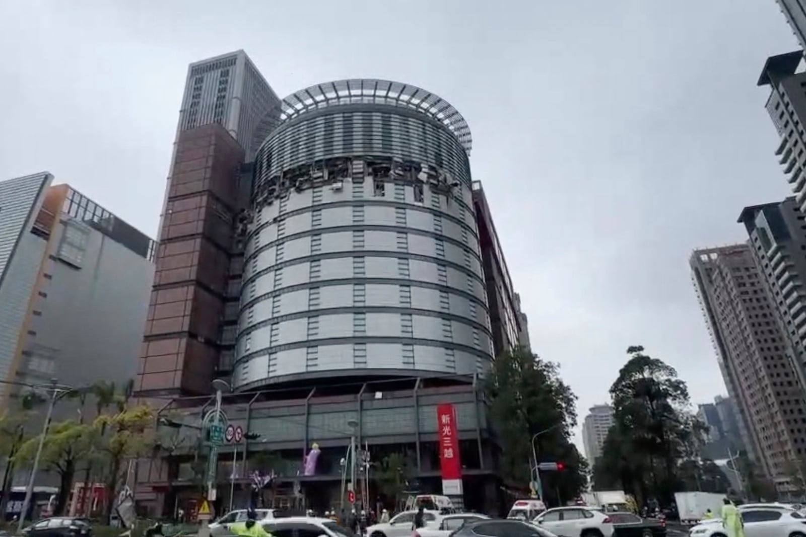 This image taken from video by Taiwan's TVBS shows the damaged facade of the Shin Kong Mitsukoshi department store after an explosion in Taichung city in Taiwan on Thursday, Feb. 13, 2025. (TVBS via AP )