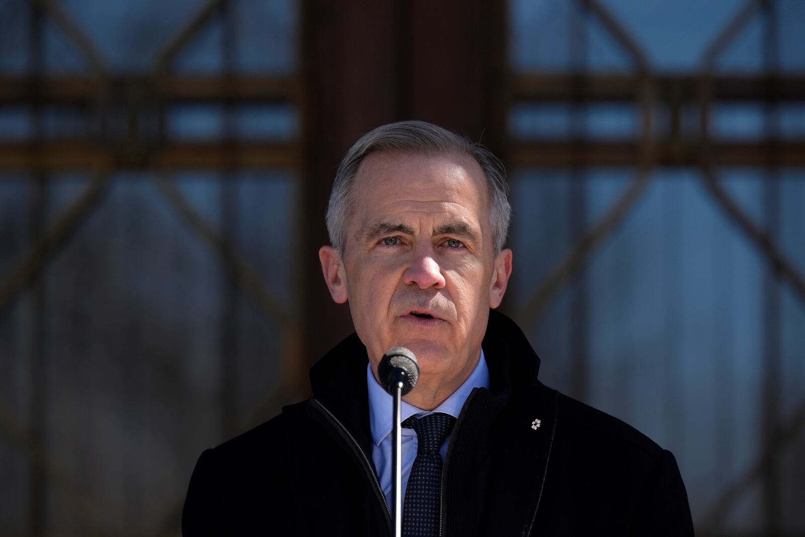 Canada Prime Minister Mark Carney speaks to media at Rideau Hall, where he asked the Governor General to dissolve Parliament and call an election, in Ottawa, Sunday, March 23, 2025. (Adrian Wyld/The Canadian Press via AP)