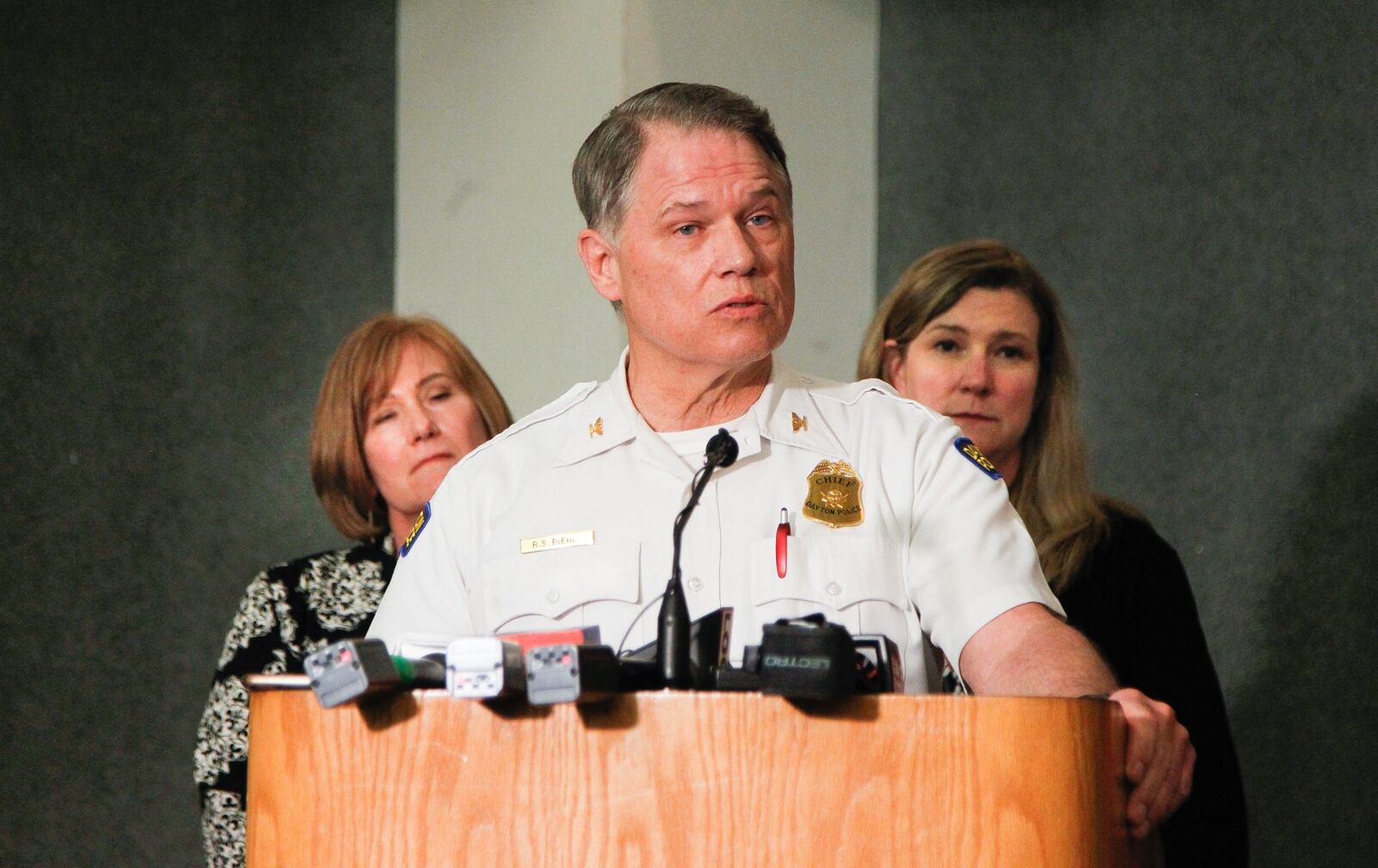 Dayton Police Chief Richard Biehl speaks at a news conference following an afternoon of no arrests, officer use of force, nor injuries in the wake of a KKK-affiliated group’s rally on Saturday. Behind Biehl is Dayton City Manager Shelley Dickstein, left, and Mayor Nan Whaley. CHRIS STEWART / STAFF