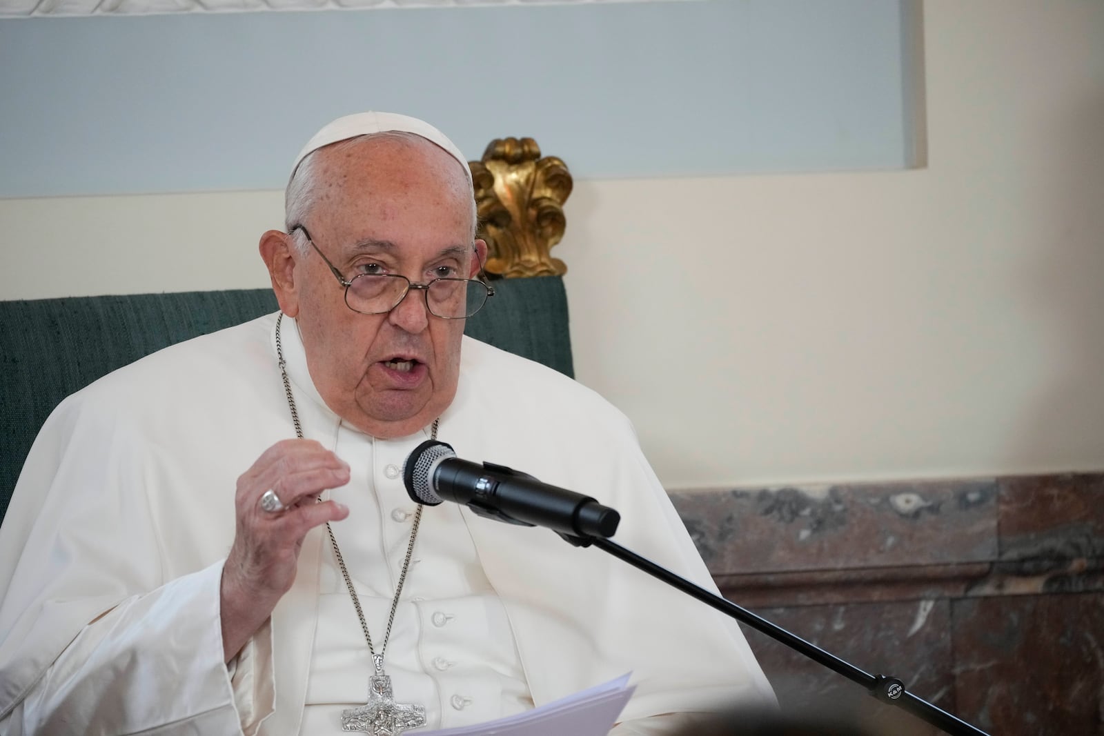 Pope Francis delivers his message during a meeting with the authorities and the civil society in the Grande Galerie of the Castle of Laeken, Brussels, Friday, Sept. 27, 2024. (AP Photo/Andrew Medichini)