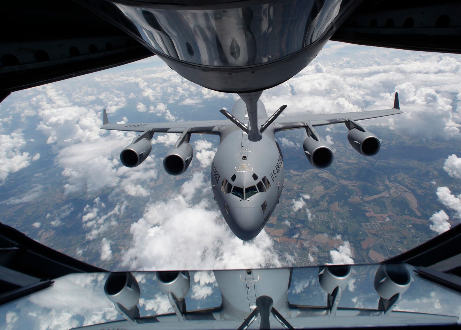 A C-17 from the 445th Airlift Wing at Wright-Patterson Air Force Base is refueled by the 434th Air Refueling Wing, from Grissom Air Reserve Base, Ind., over Kentucky. The Air Force Life Cycle Management Center,  headquartered at Wright-Patterson, operates maintenance depots and works to keep planes in the air.  TY GREENLEES / STAFF