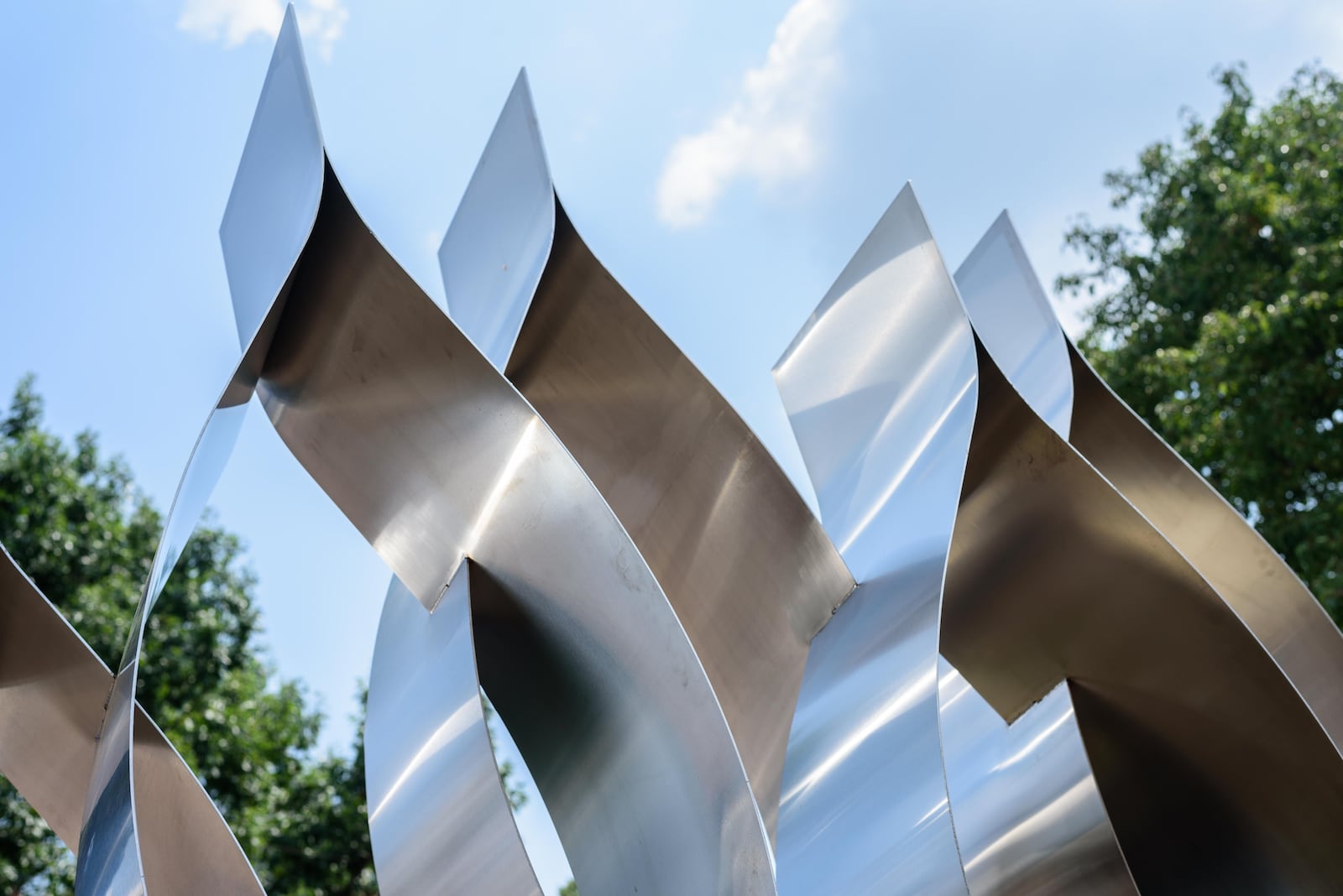 Here are scenes from the unveiling and dedication ceremony for The Seed of Life 8/4 Memorial, located at 530 E. Fifth St. in The Oregon District next to The Trolley Stop on Sunday, Aug. 4, 2024. The memorial, created to honor the victims of the Aug. 4, 2019 Oregon District shooting, is a collaboration by Terry Welker, Jes McMillan, Sierra Leone, and James Pate with help from 5,000 volunteers. TOM GILLIAM / CONTRIBUTING PHOTOGRAPHER