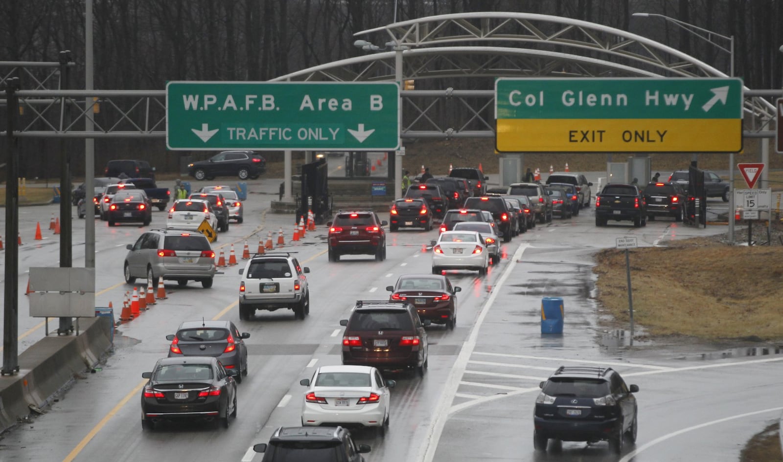 Area B gate at Wright-Patterson Air Force Base during the morning rush. New economic impact numbers based on Department of Defense reporting and a private analysis show direct and indirect business and employee spending from Wright-Patterson, Dayton VA and Springfield Air National Guard base infuses $16.68 billion into the local economy. TY GREENLEES / STAFF