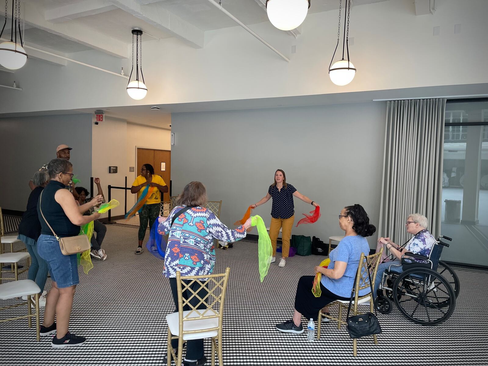 Dance therapy is a new wellness class offered at the Dayton Arcade with the goal of attendees finding a connection between themselves and others. NATALIE JONES/STAFF