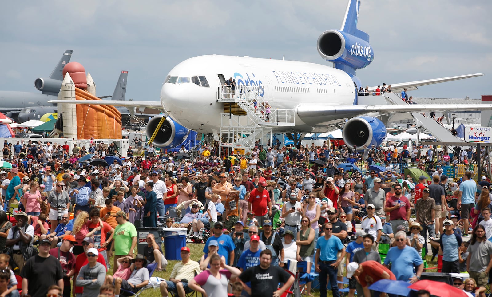 A large crowd watches performers in 2018 at the Dayton Air Show.  FILE