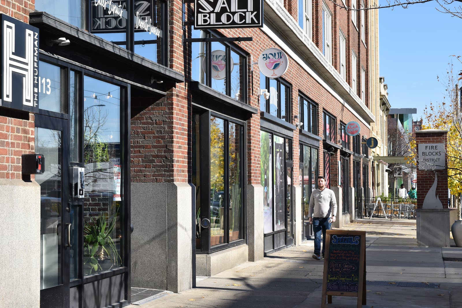 Multiple new businesses have opened this year in the Fire Blocks District in downtown Dayton, including Corporate, After5 and Modern Eye. CORNELIUS FROLIK / STAFF