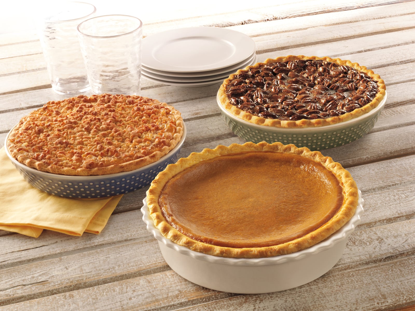 Bob Evans pies, from left clockwise, include double crust apple, pecan and pumpkin. Contributed photo.