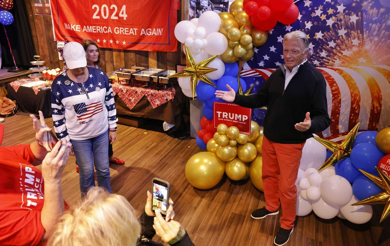 Butler County Commissioner TC Rogers gets a photo taken during the Butler County Republican Party election results watch party Tuesday, Nov. 5, 2024 at Lori's Roadhouse in West Chester Township. NICK GRAHAM/STAFF