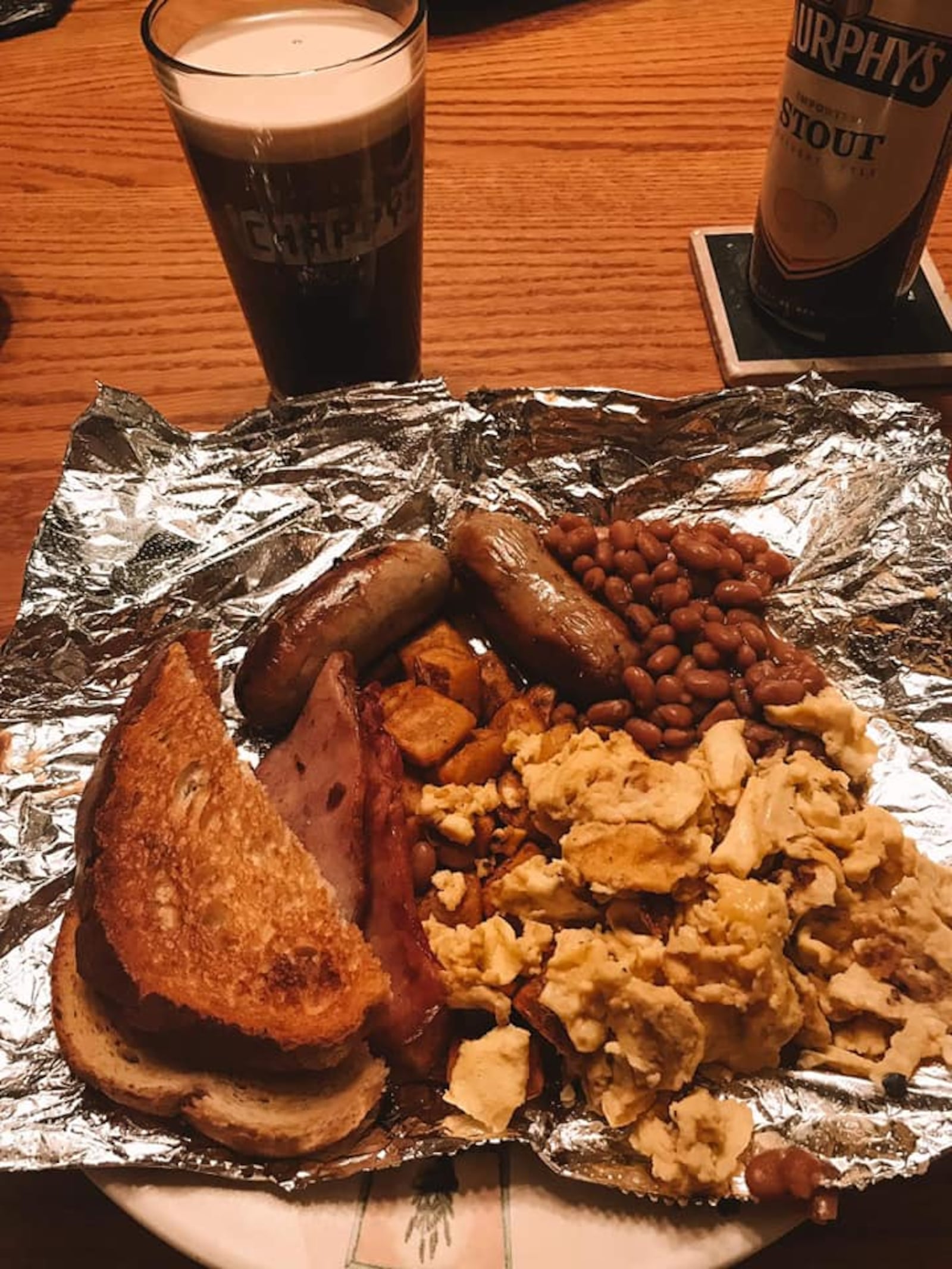 The Dublin Pub began serving a traditional Irish breakfast at 5:30 a.m. for carryout customers on St. Patrick's Day,  March, 17, 2020. The Oregon District restaurant planned to delivery food, wine and beer to patron throughout the day. They could also carry it out or have it hopped to their car. Centerville resident Hunter Johnson picked breakfast for his family and friend.