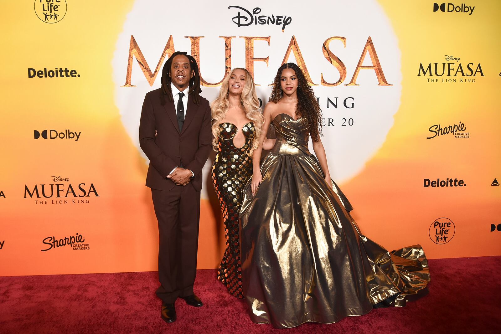 Jay-Z, from left, Beyoncé and Blue Ivy Carter arrive at the premiere of "Mufasa: The Lion King" on Monday, Dec. 9, 2024, at the Dolby Theatre in Los Angeles (Photo by Richard Shotwell/Invision/AP)