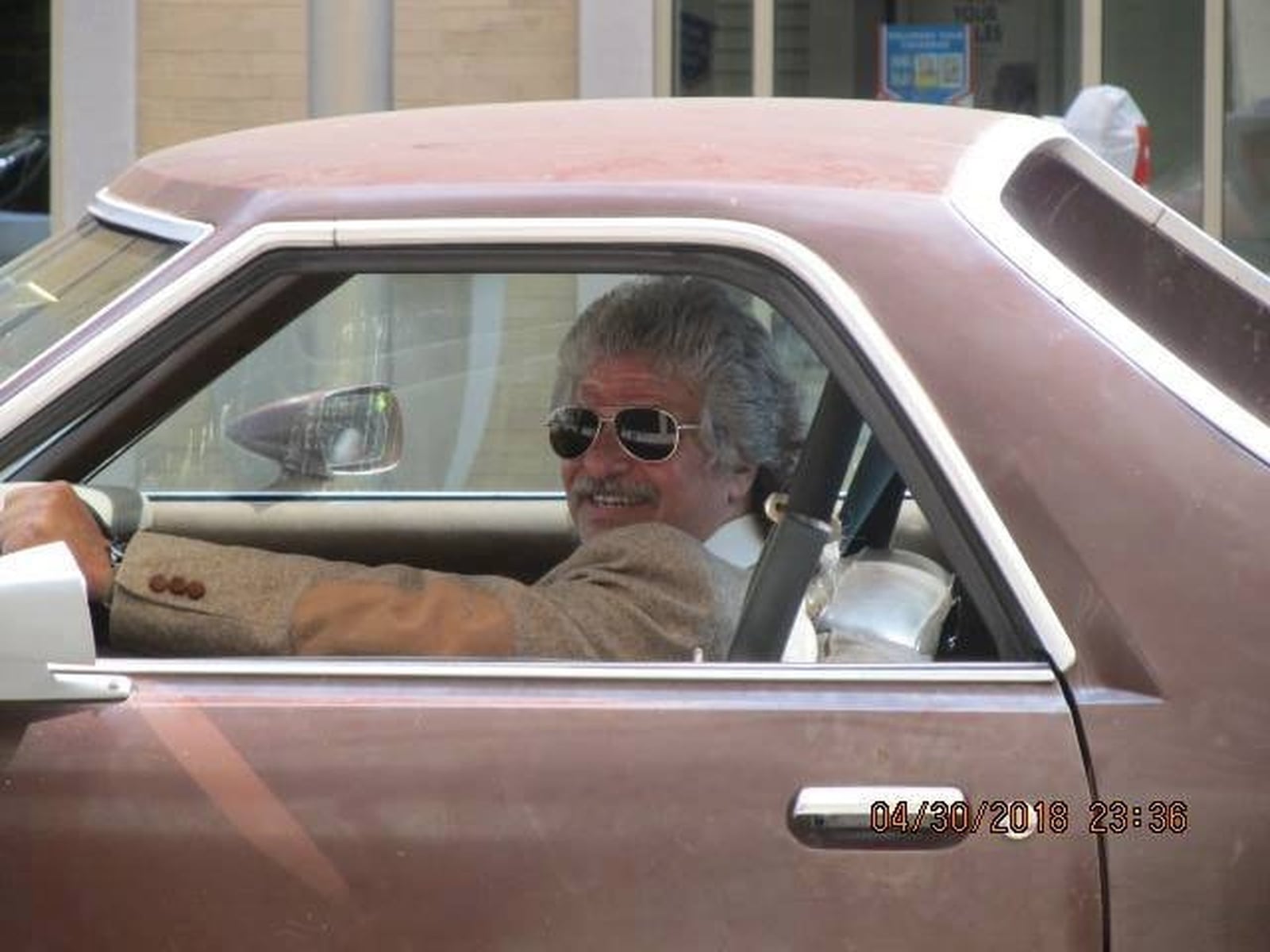 Scott Walker worked May 1 as an extra to drive a car in downtown Dayton during the filming of the ‘Old Man and the Gun,’ starring Academy award winners Robert Redford and Casey Affleck. Amelia Robinson photo