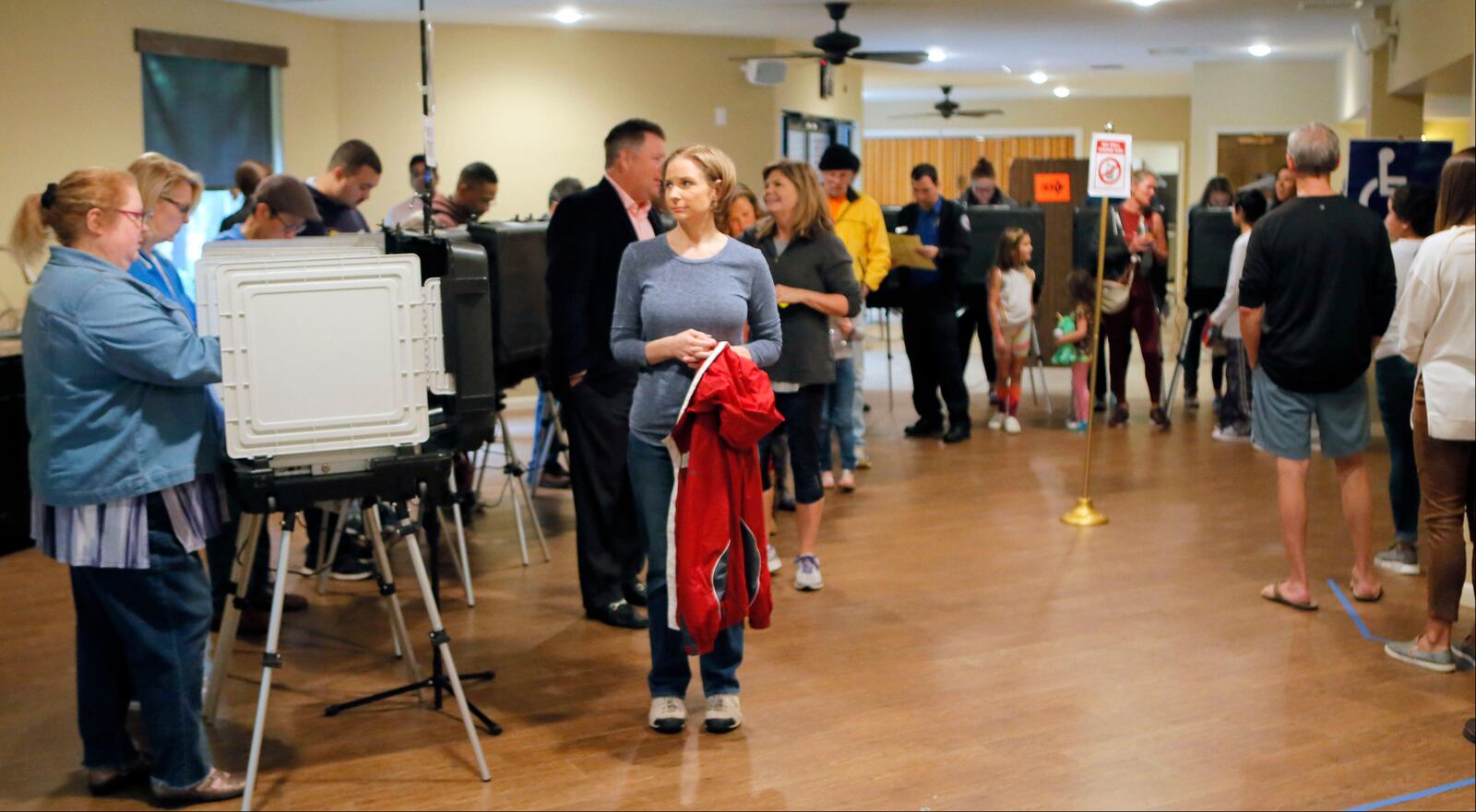 A steady steam of people vote at St. Mary's Orthodox Church in Roswell, Ga., Tuesday, Nov. 6, 2018. 