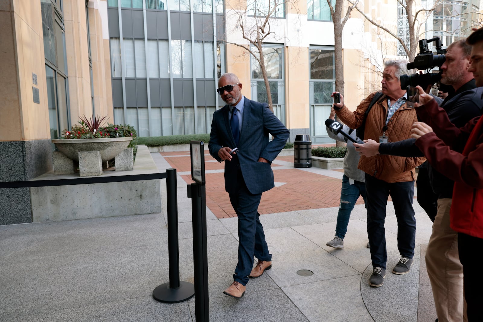 Andre Jones, along with his partner Sheng Thao, the former mayor of Oakland were criminally indicted by a federal grand jury after an FBI corruption investigation, arrives at the United States District Court in Oakland, Calif., on Friday, Jan. 17, 2025. (Santiago Mejia/San Francisco Chronicle via AP)