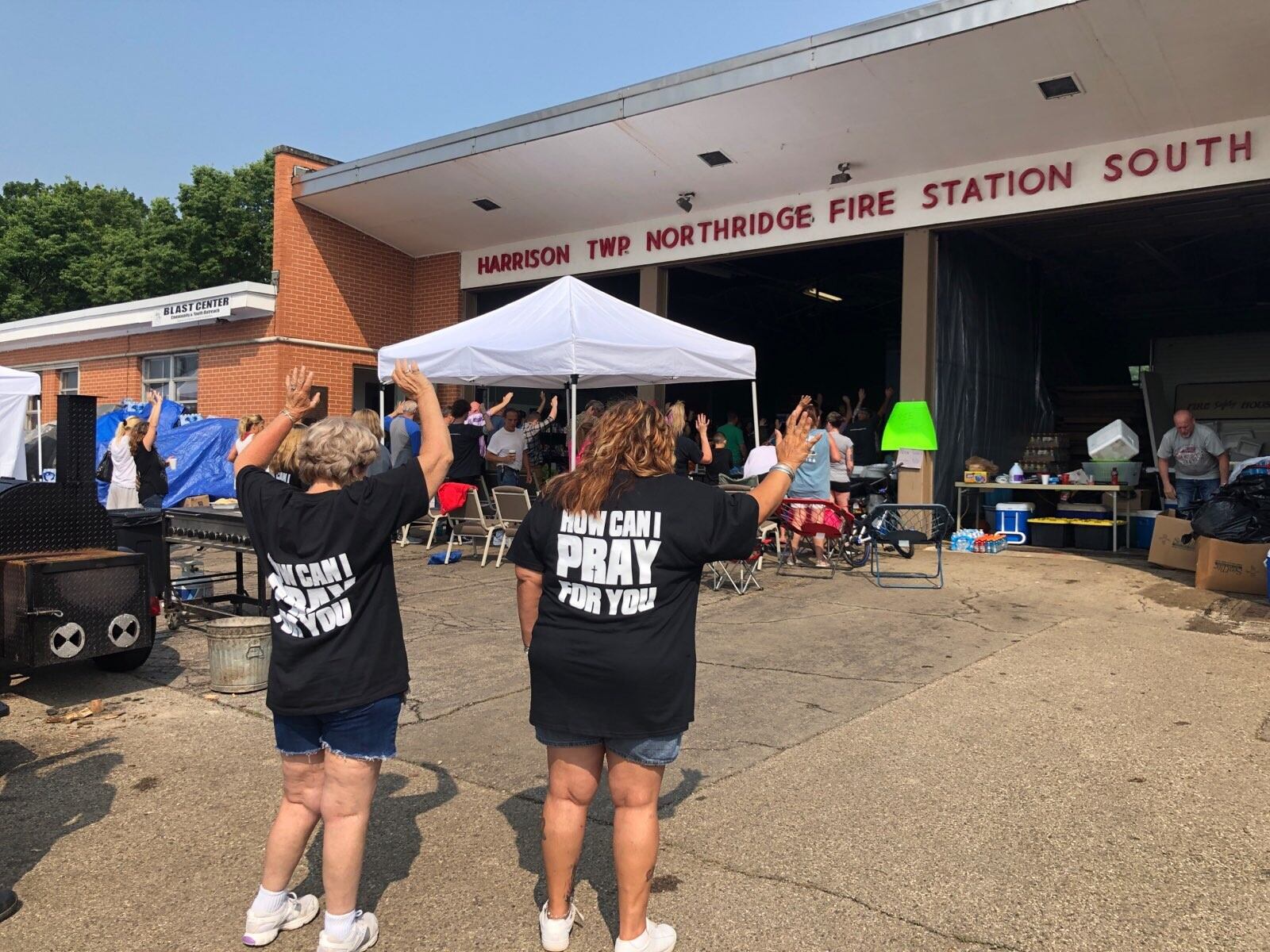 Around 50 people with the New City Church met in a fire station because their building was severely damaged by the storms. SARAH HAGAN