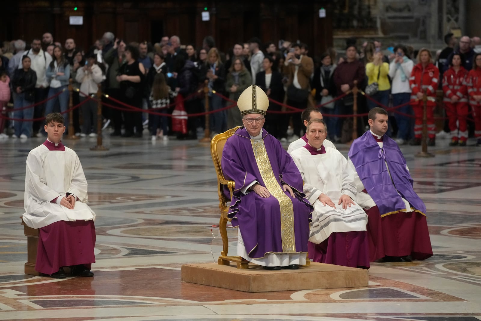 Vatican Secretary of State, Cardinal Pietro Parolin, center, delegated by Pope Francis who's being treated for pneumonia at Rome's Agostino Gemelli Polyclinic, presides over a mass with the pilgrims of the "Movement for Life" in St. Peter's Basilica at The vatican, Saturday, March 8, 2025. (AP Photo/Gregorio Borgia)