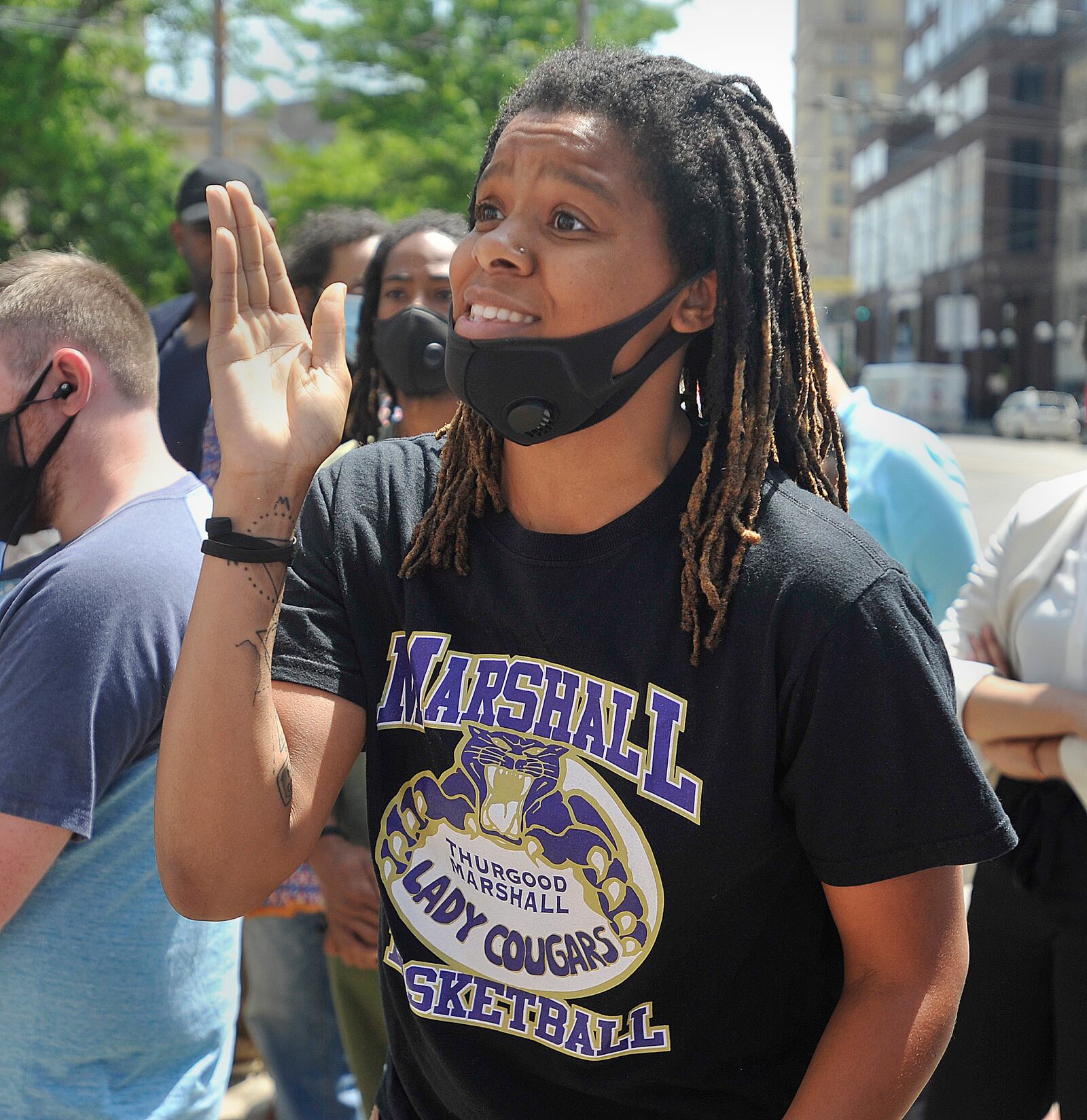 Alana Brookshire, ask questions to the Dayton Mayor and Police Chief, during a press conference at City Hall Wednesday. MARSHALL GORBY\STAFF